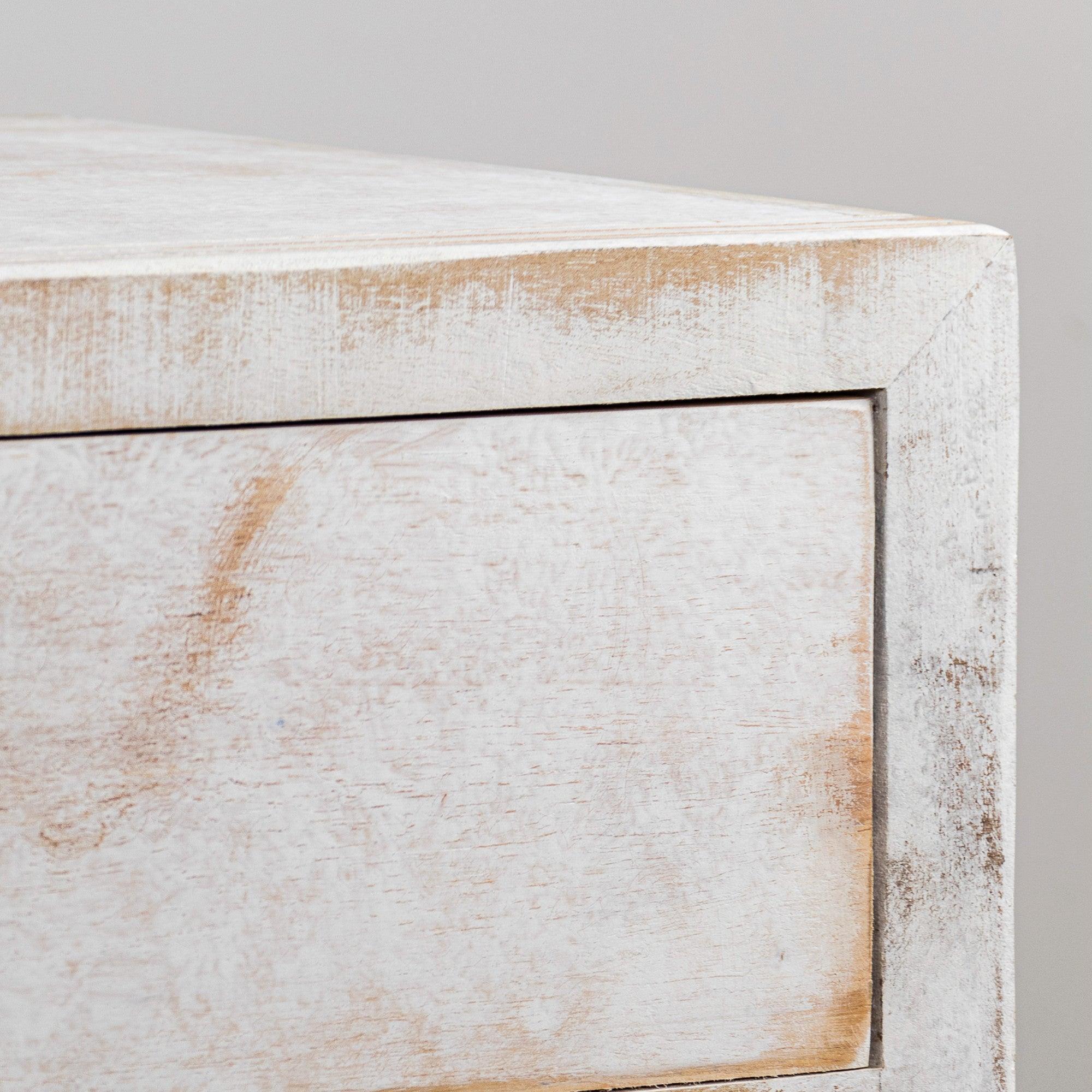 White solid wood nightstand front with single drawer and black pull