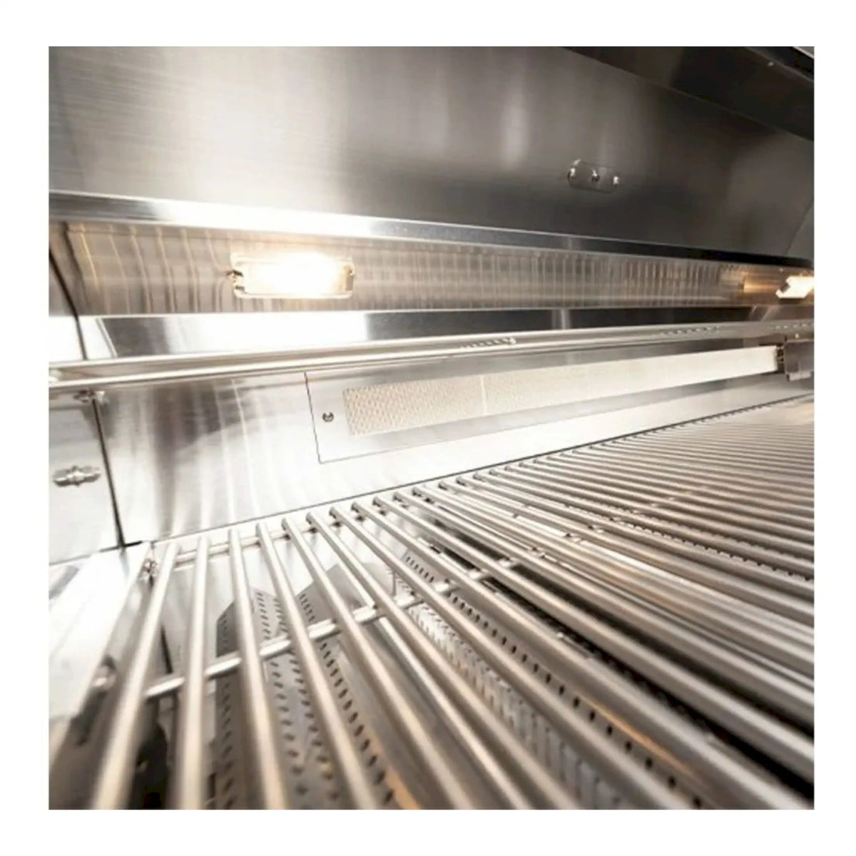 Open stainless steel propane grill showing cooking grates and burner area