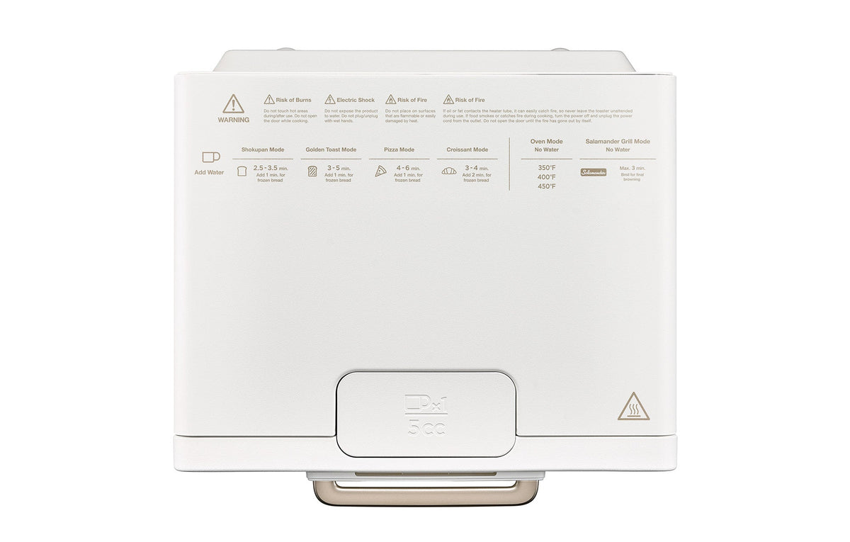 Off-white countertop toaster oven rear view with safety icons and control area