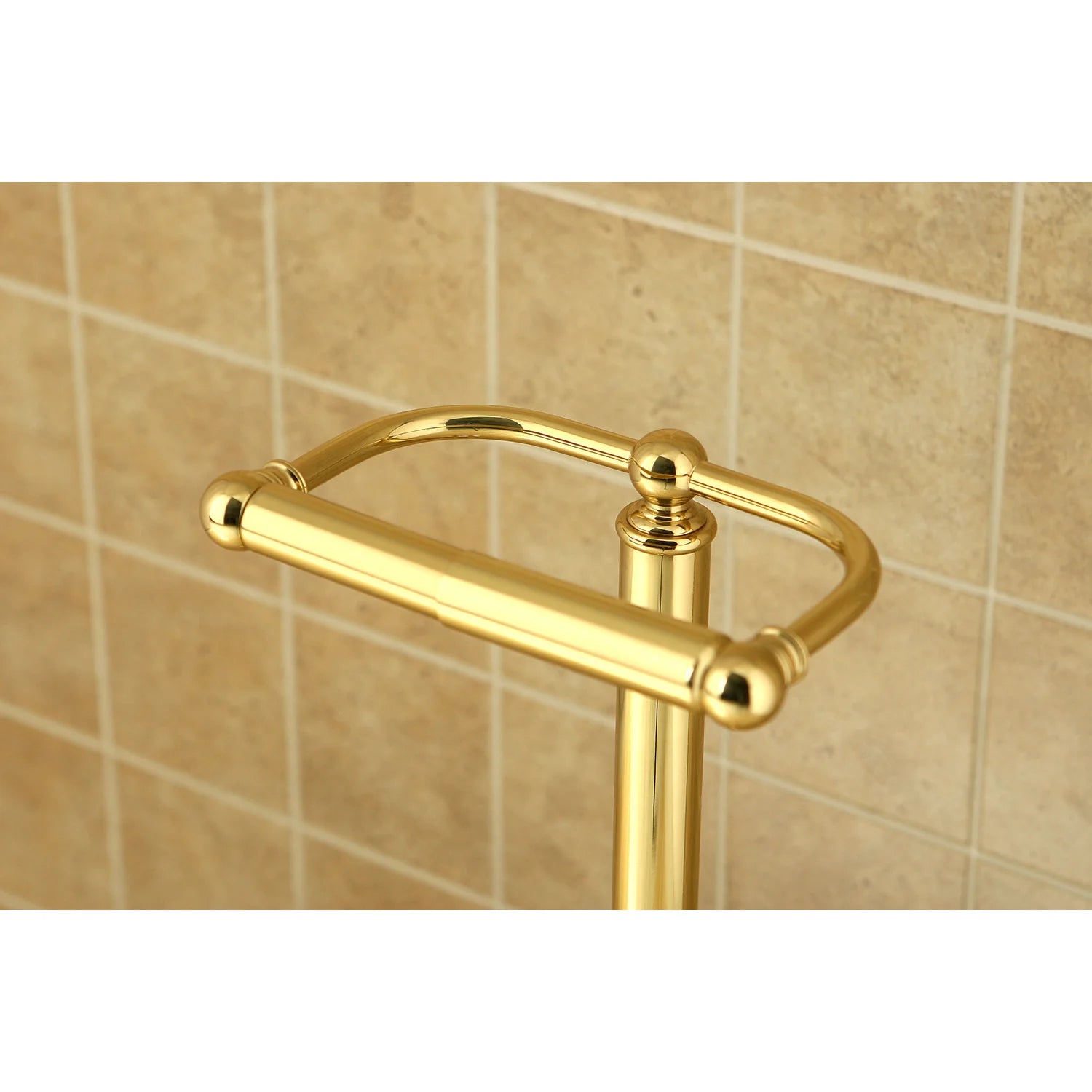 Freestanding toilet paper holder with polished brass roller and end finials