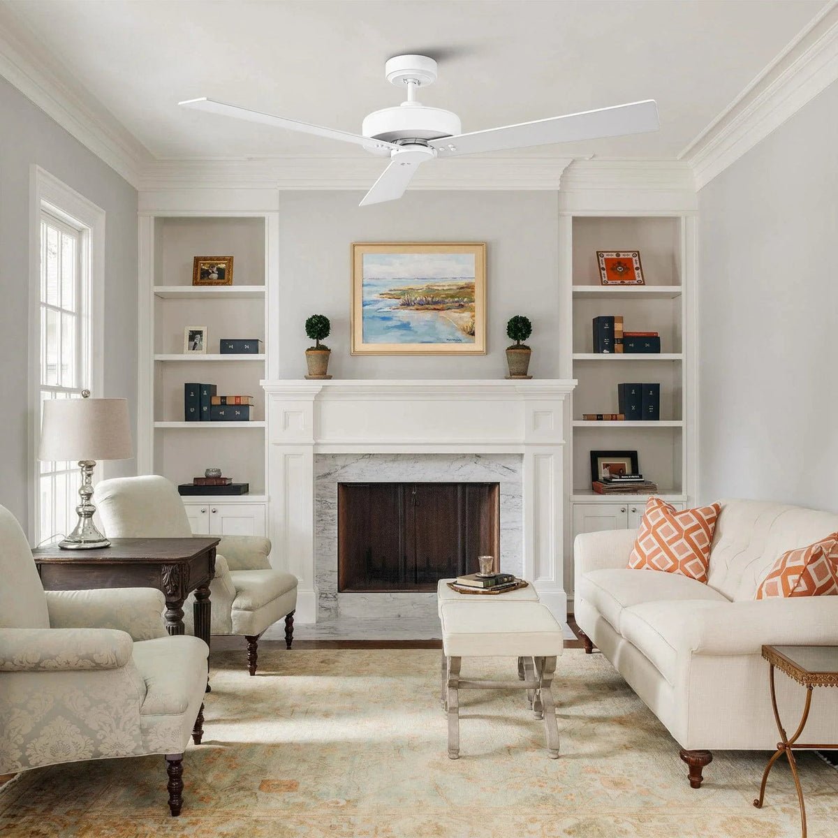 White ceiling fan with 4 blades above a living room fireplace