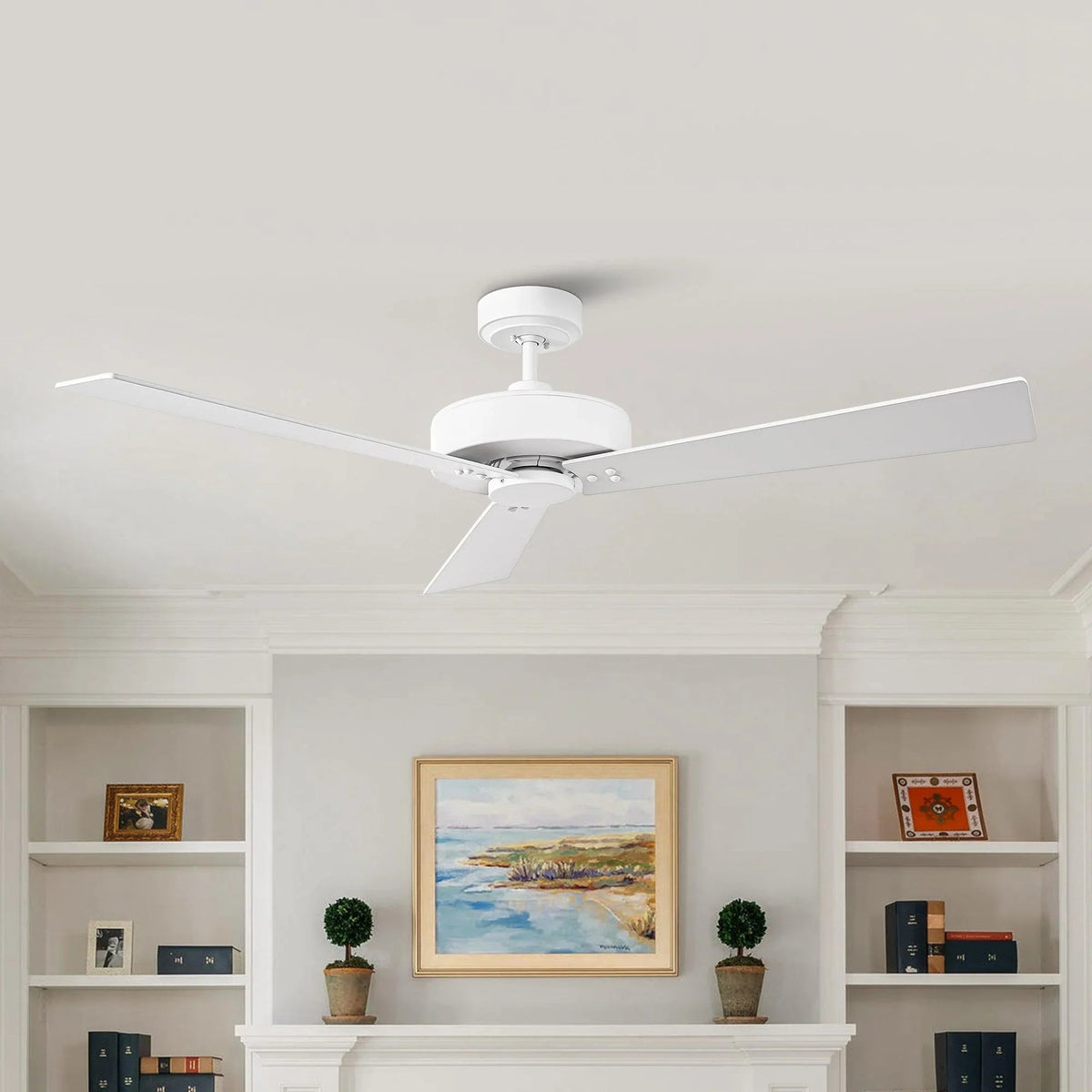 White ceiling fan with 4 blades on a living room ceiling