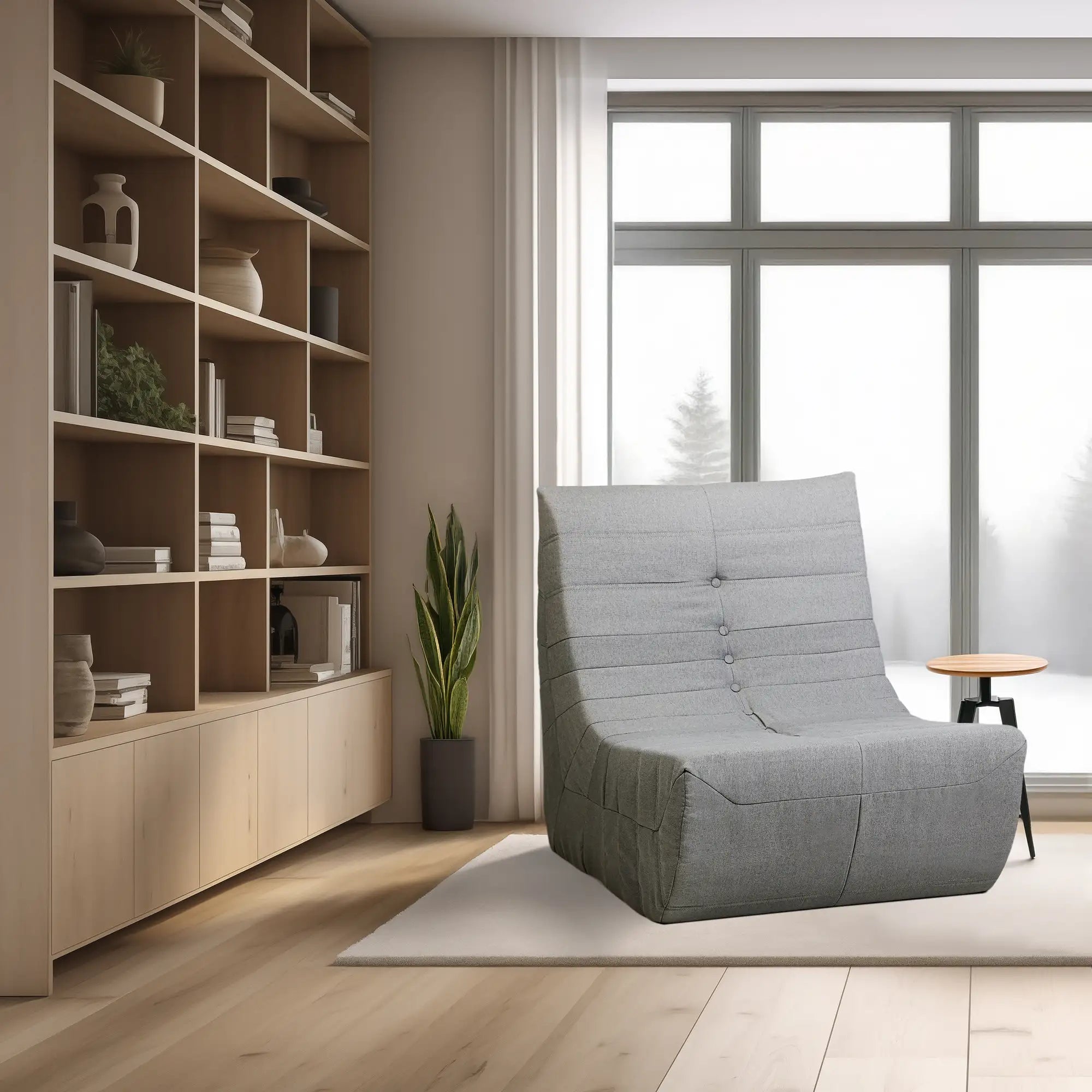 Gray compressed foam accent chair in a room setting, tufted back and curved arms.