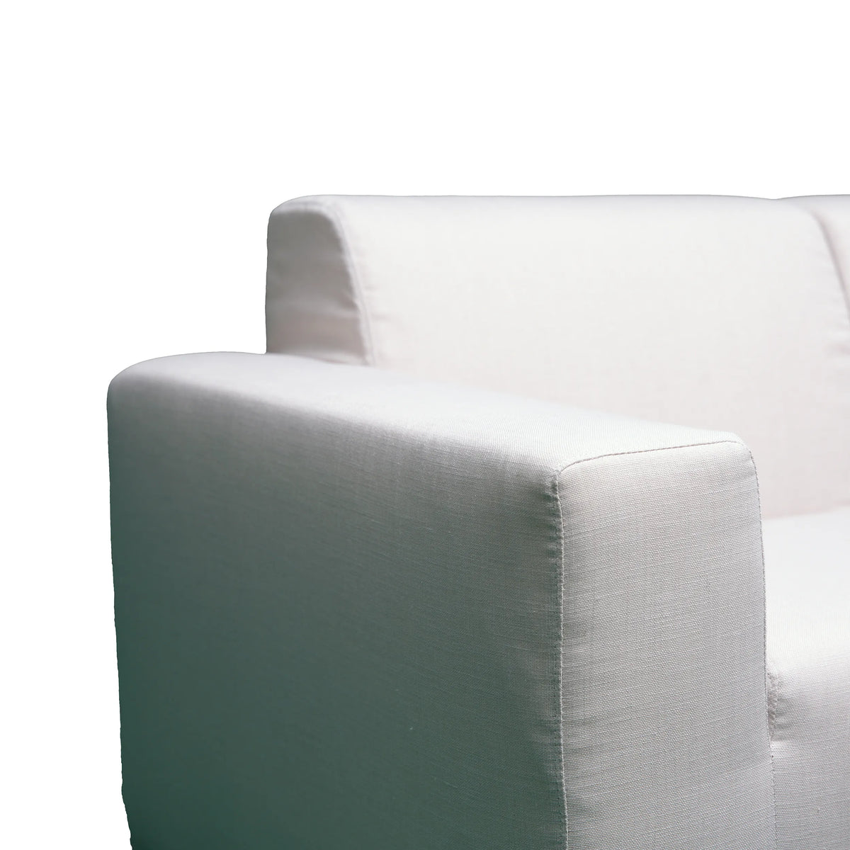 Beige sectional sofa armrest with textured fabric and firm padded corner.