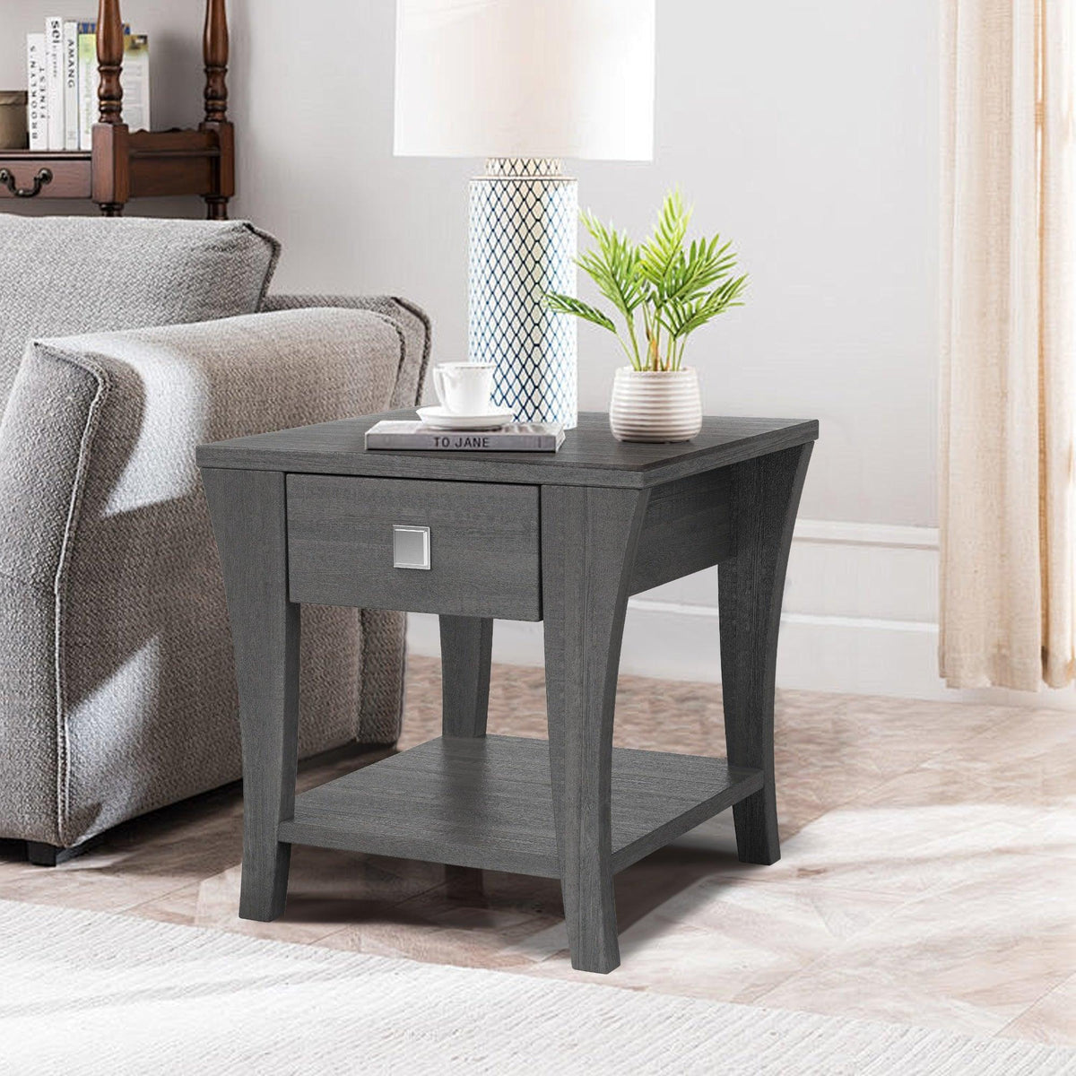 Gray end table with one drawer and open shelf, rectangular metal handle.