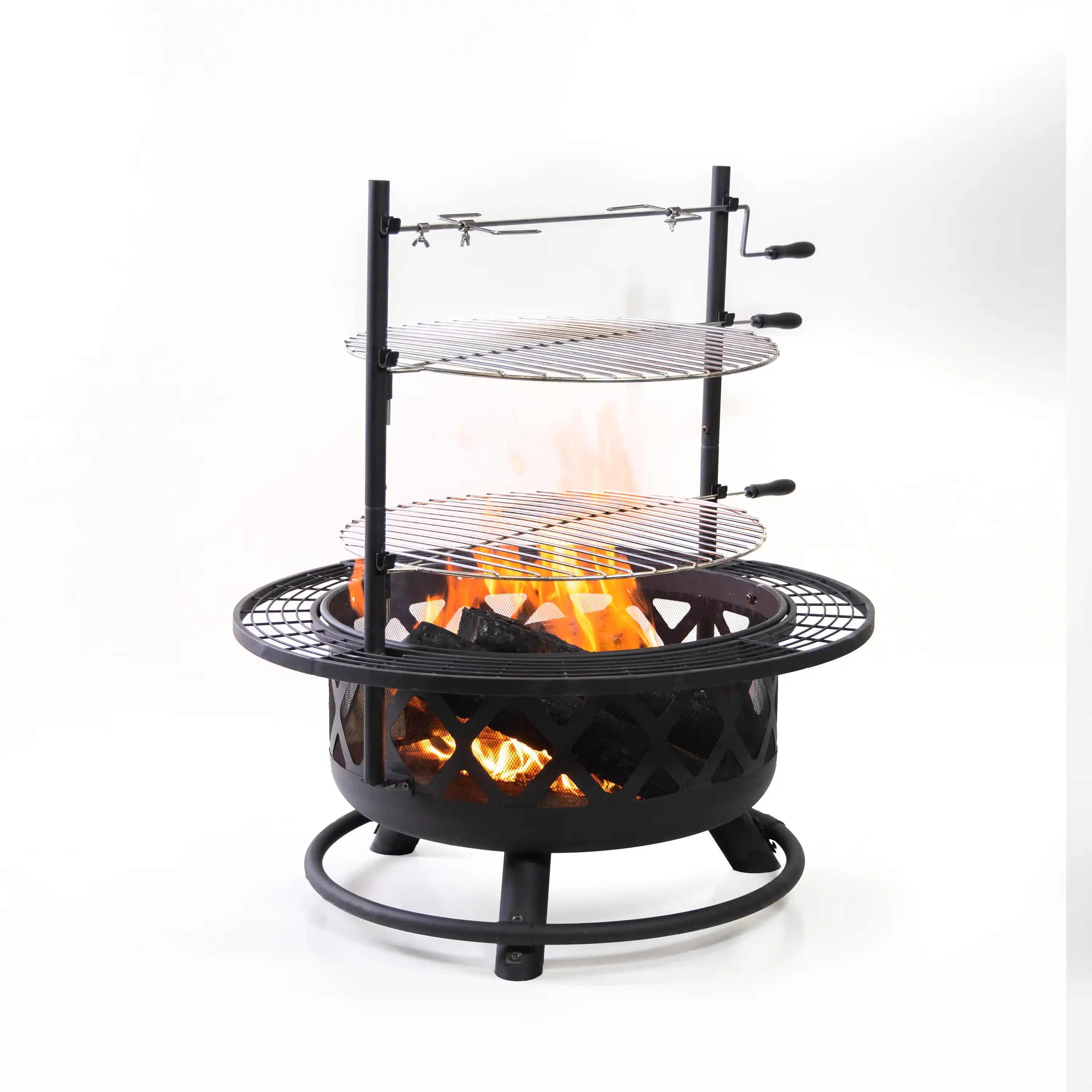 Black steel outdoor fire pit grill with rotating rotisserie frame and open flame