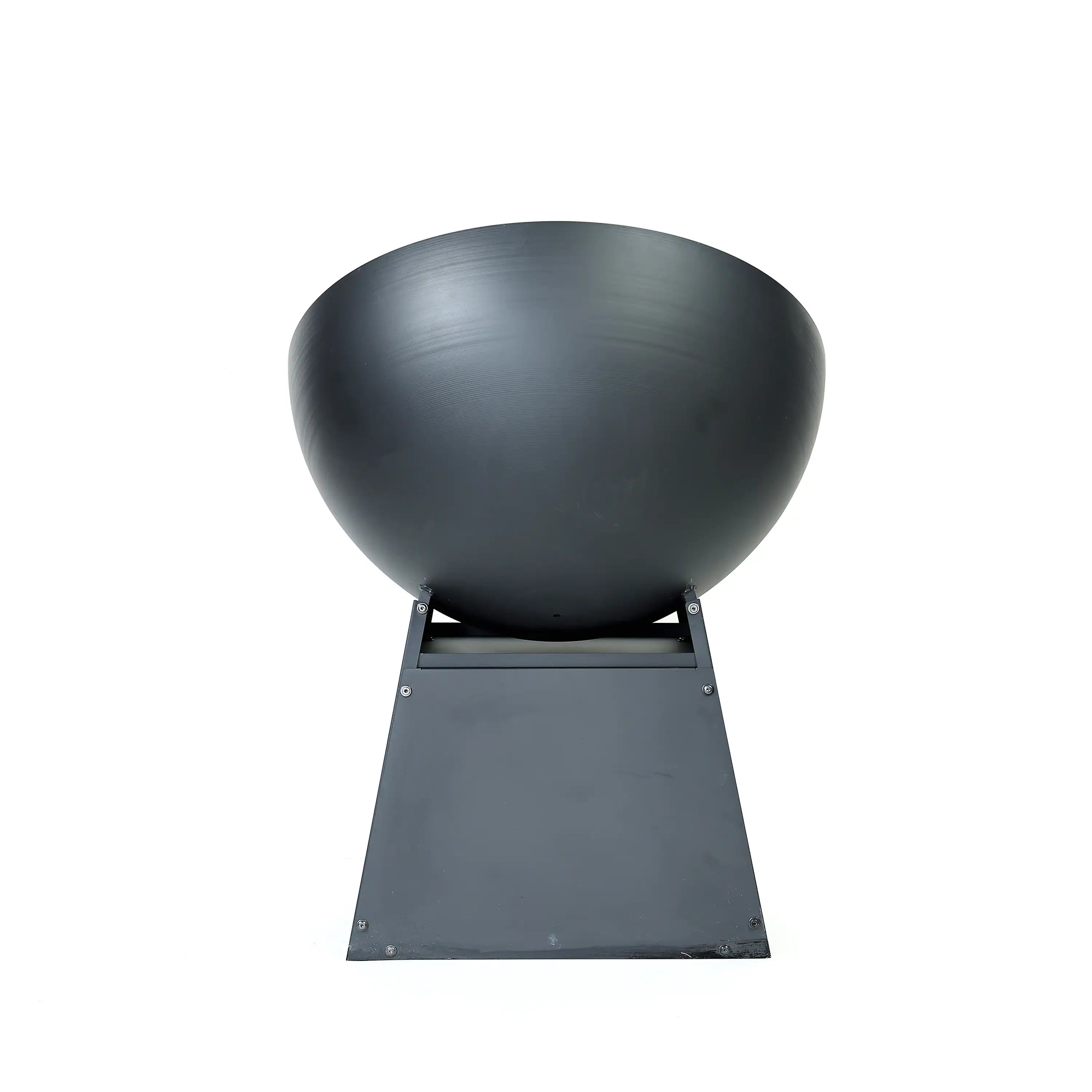 Black round fire pit bowl with low front panel and open stand for firewood.
