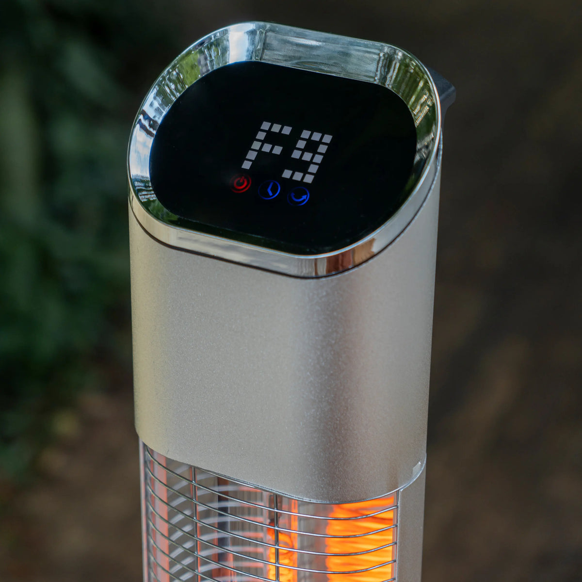 Electric tower heater with glowing control panel and carbon fiber heating grille