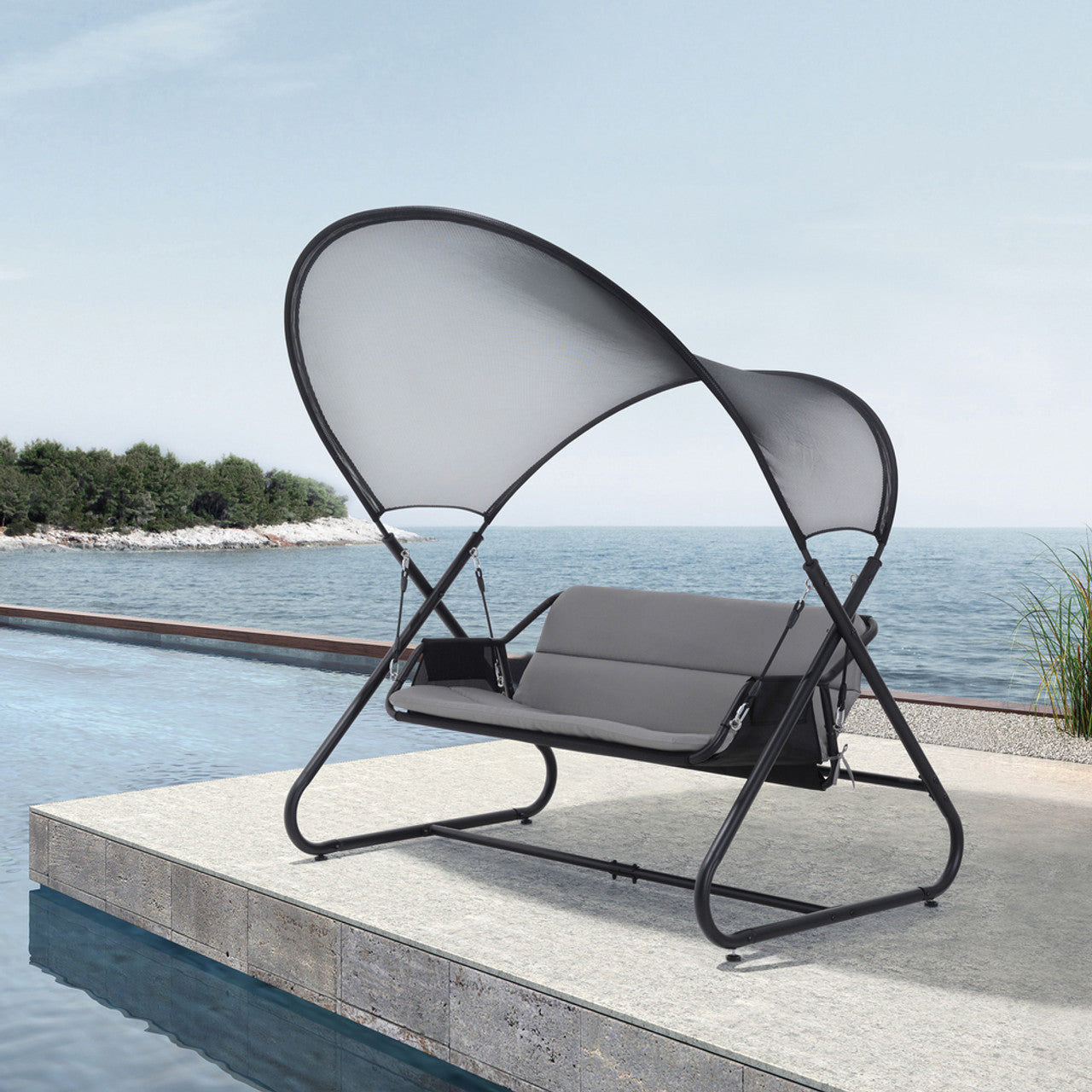Outdoor swing chair with canopy featuring dark mesh canopy and light gray seat cushions.