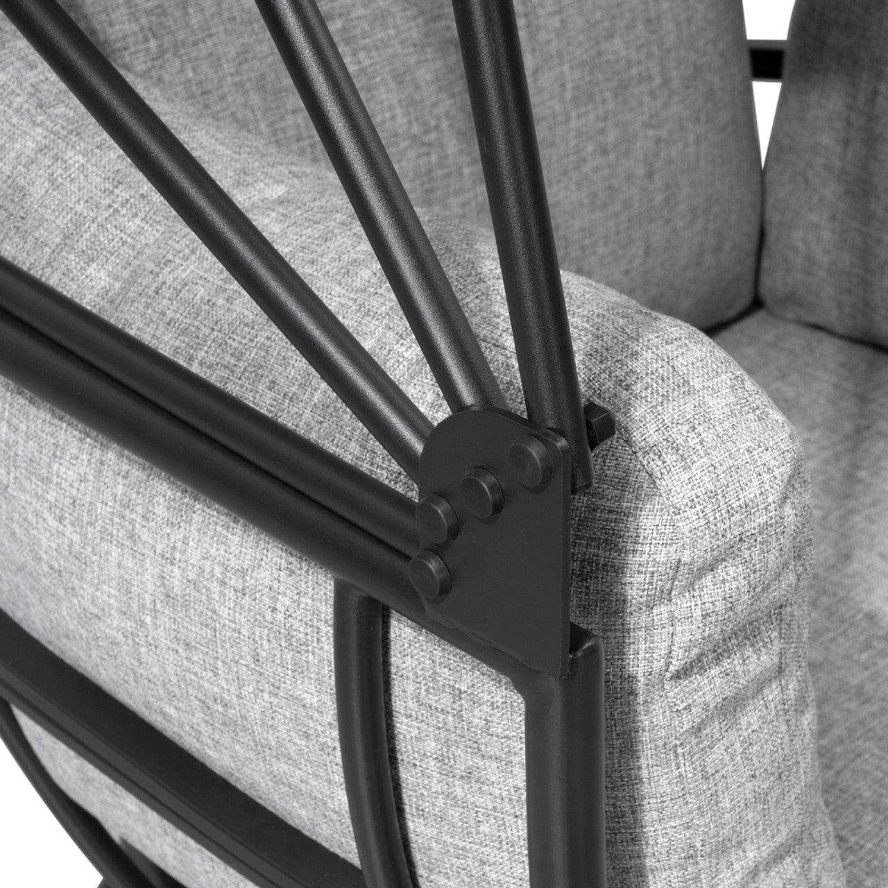 Gray upholstered armchair with black metal rocking frame and cushioned armrest detail