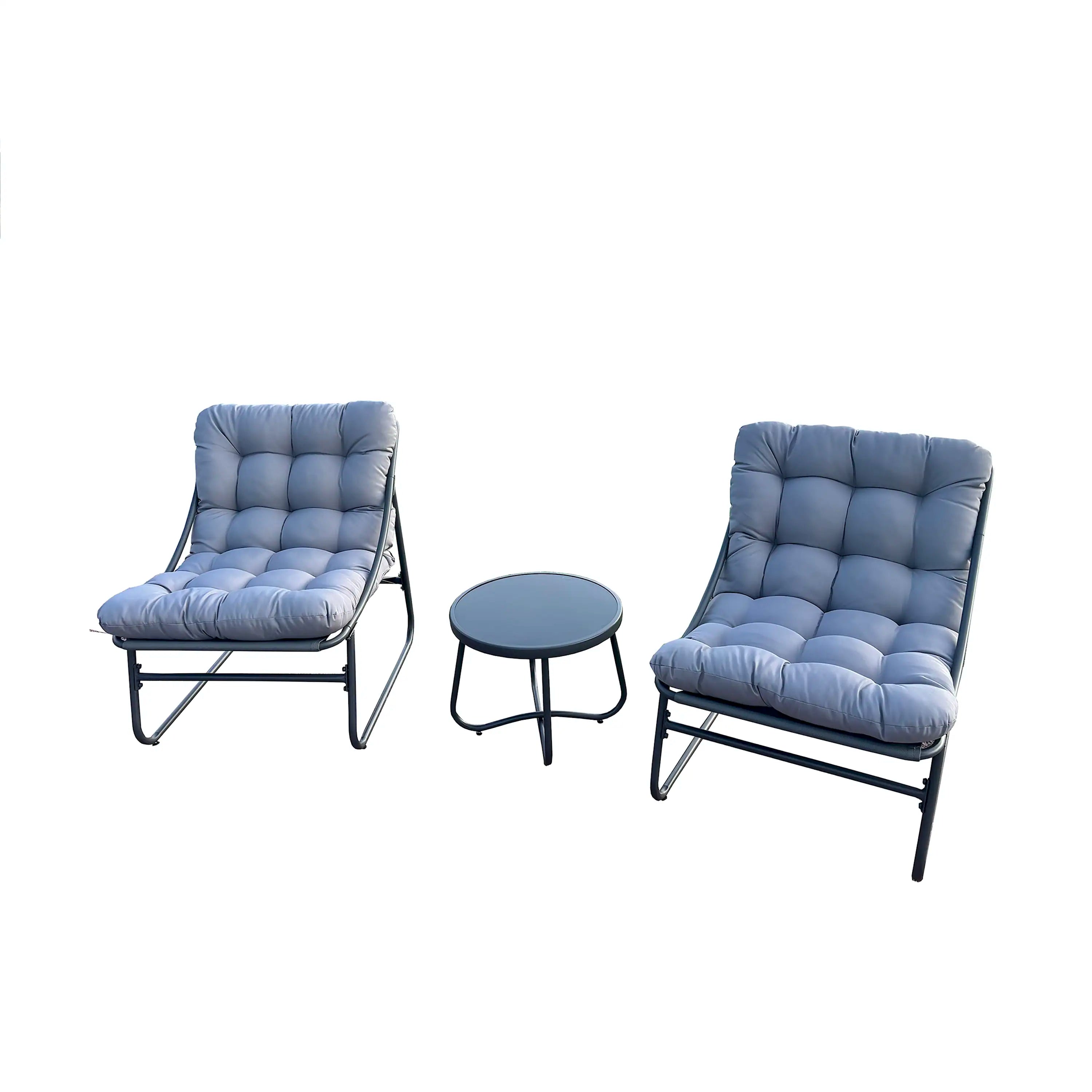 Outdoor bistro set: two blue cushion chairs and small round coffee table