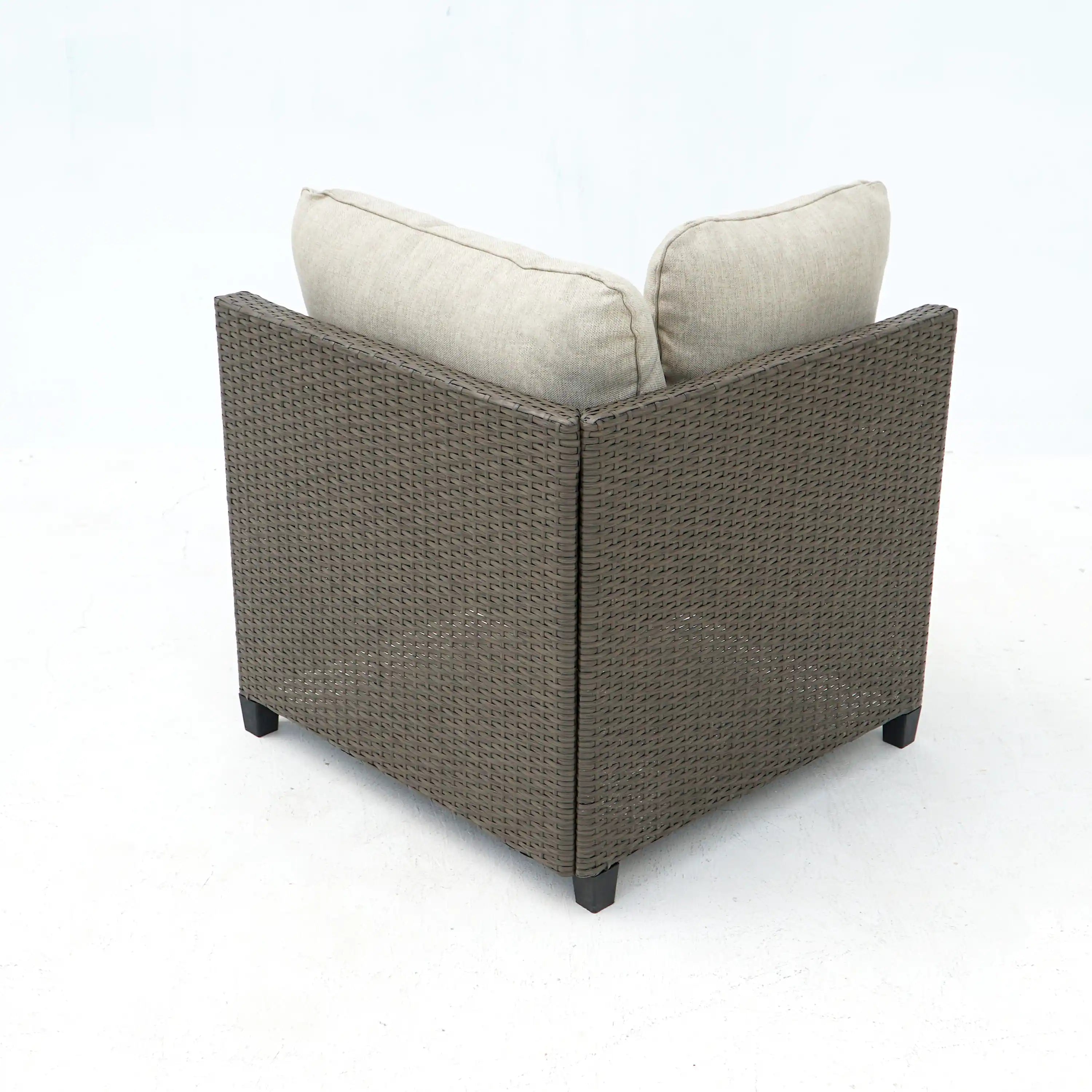 Outdoor wicker loveseat chair with light beige back cushions and dark arms