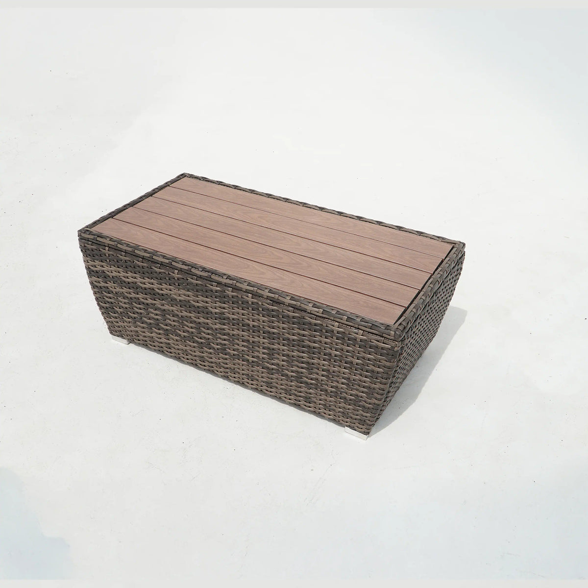 Rectangular brown woven wicker outdoor table with wood-look top