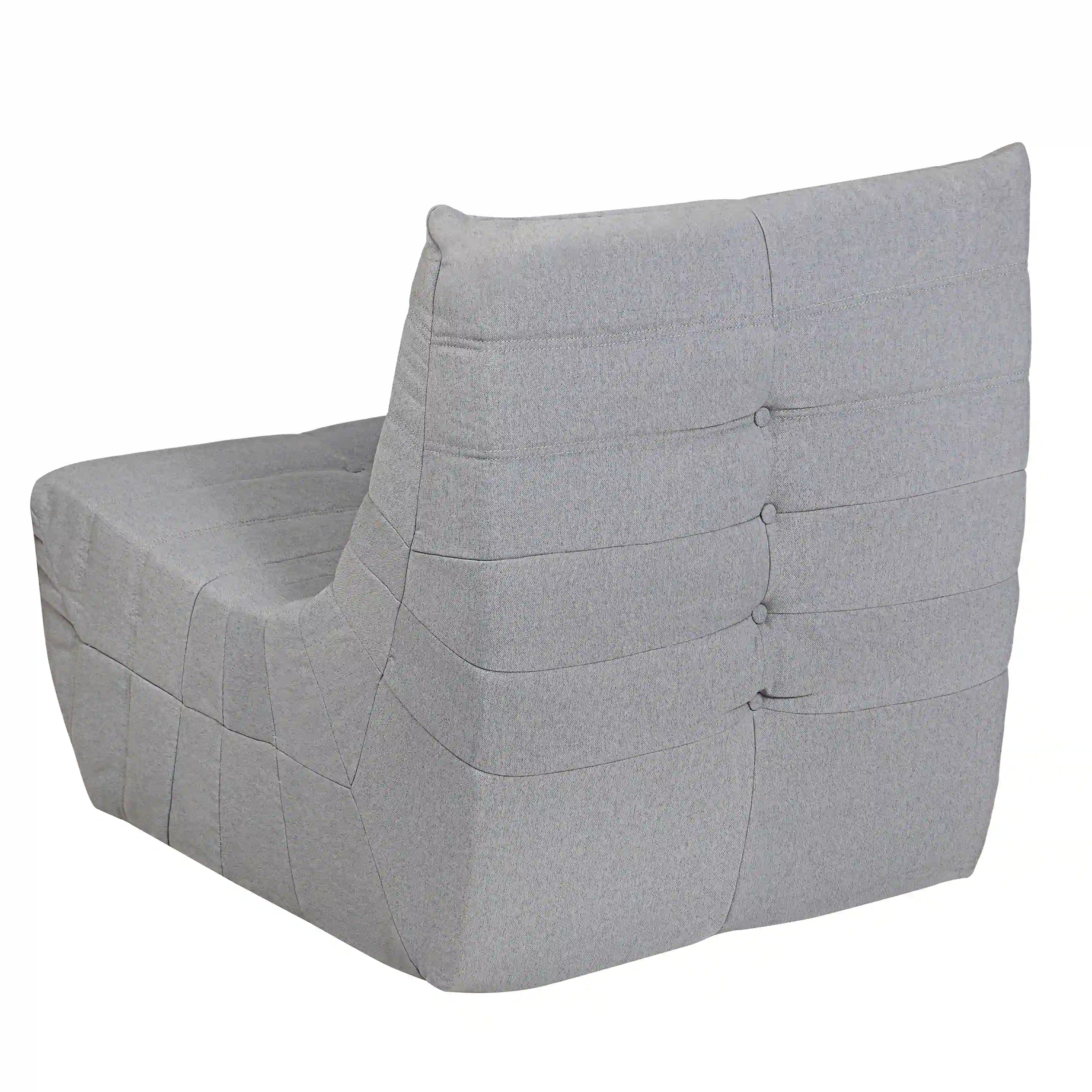 Gray outdoor compressed foam armchair with tufted back and padded arms