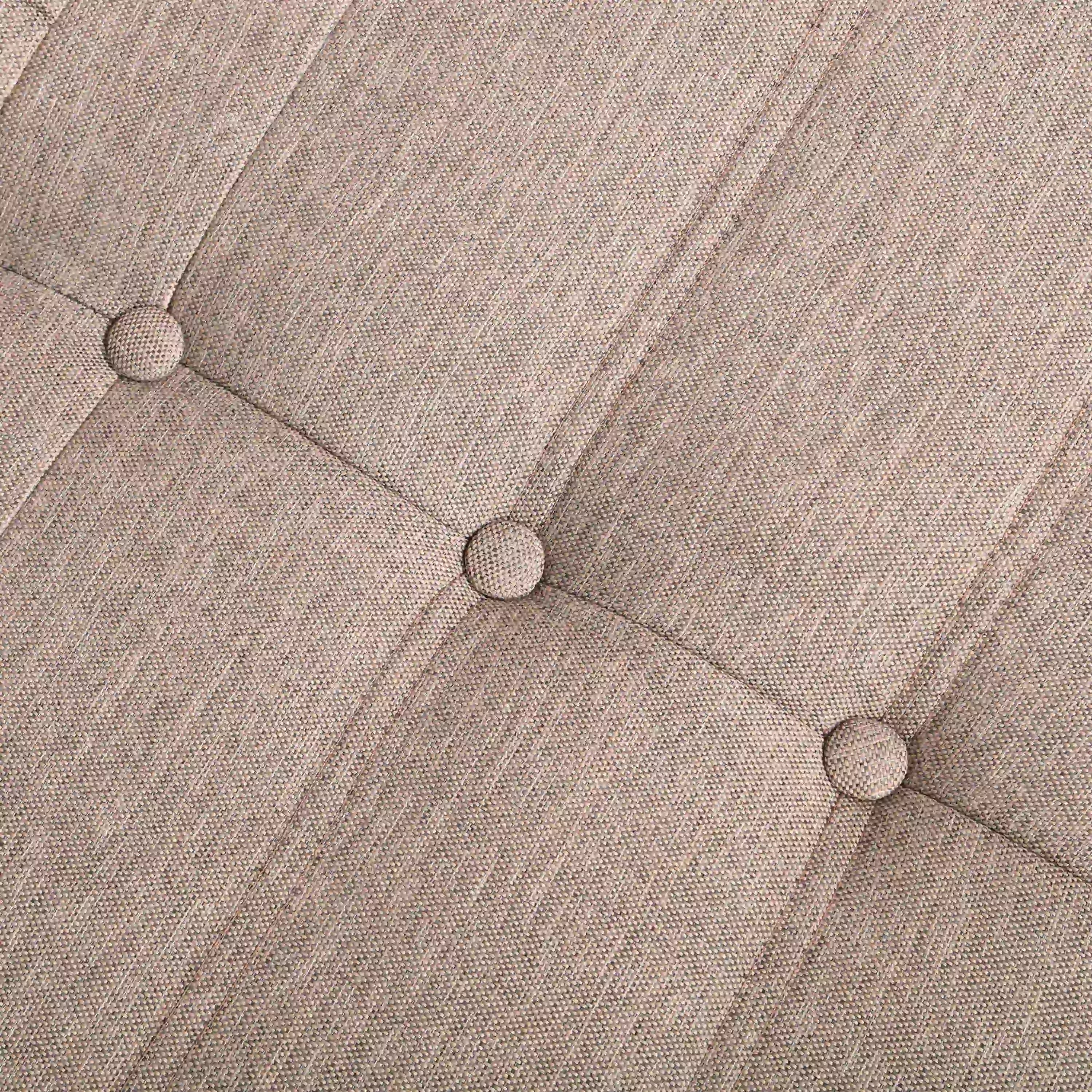 Outdoor loveseat sofa chair, close-up of brown seat cushions and tufted seams