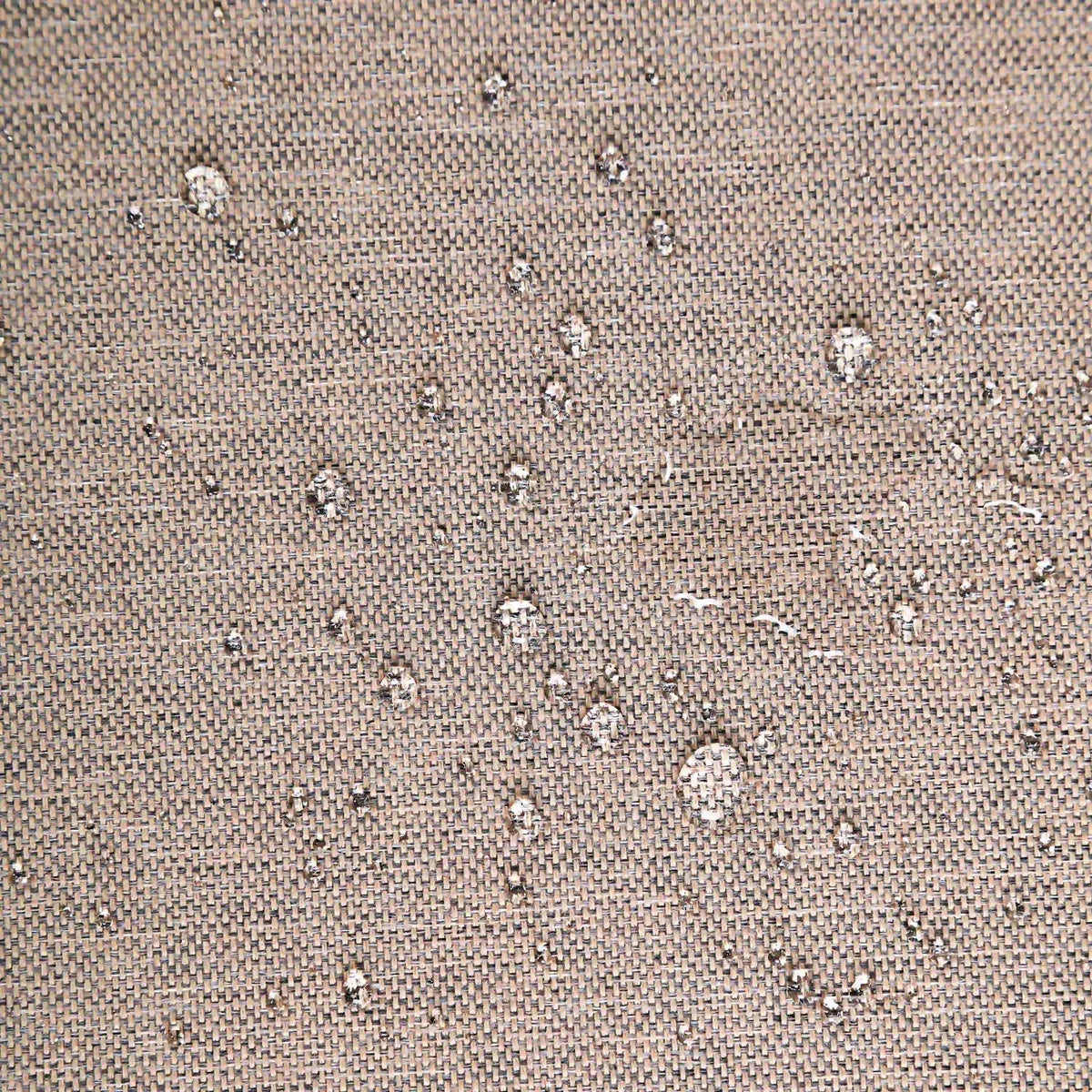 Speckled light beige fabric upholstery with tight woven texture.