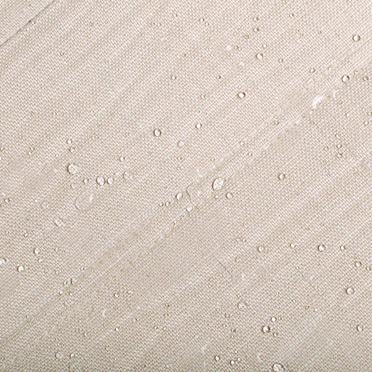 Beige woven outdoor fabric upholstery with visible water-repellent texture