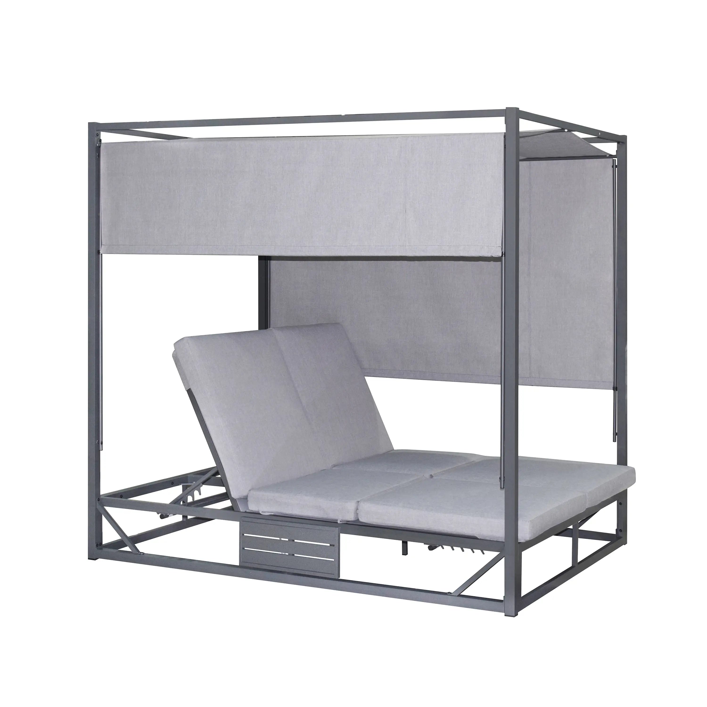 Gray outdoor patio daybed with canopy panels and layered seat cushions, wide view