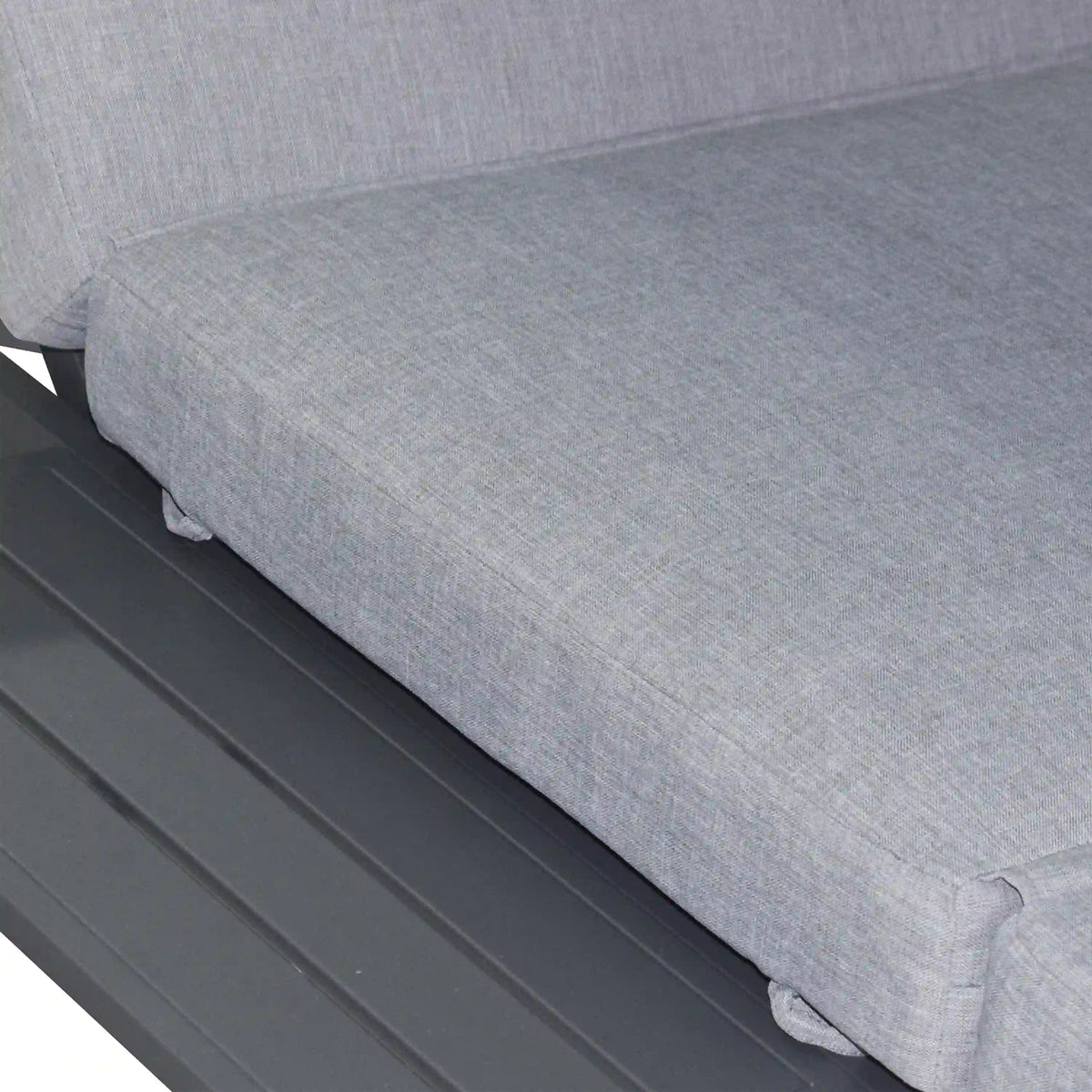 Gray outdoor patio daybed cushion on rectangular base with stitched fabric