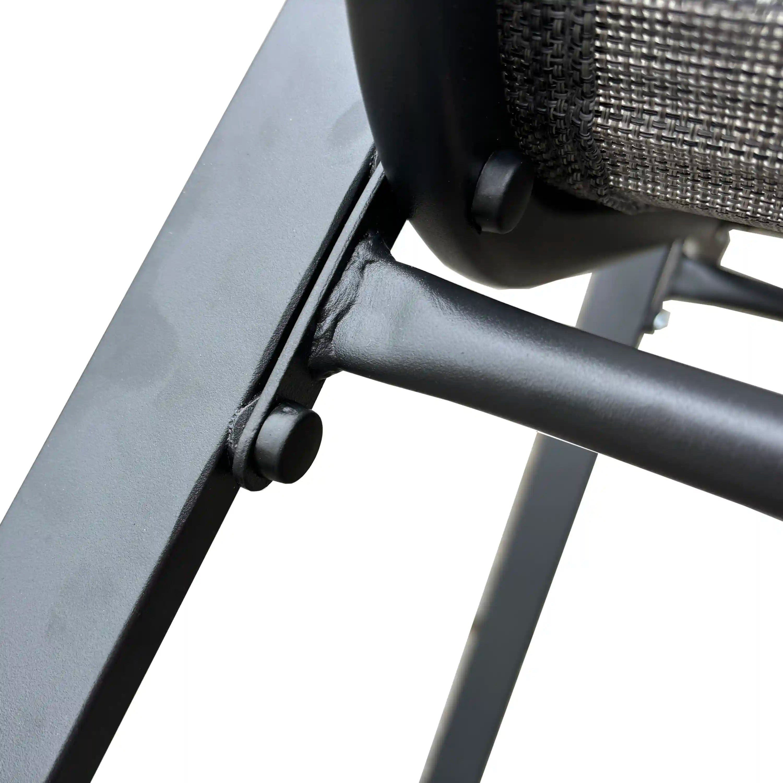 Gray outdoor chair armrest and frame corner with round hardware detail