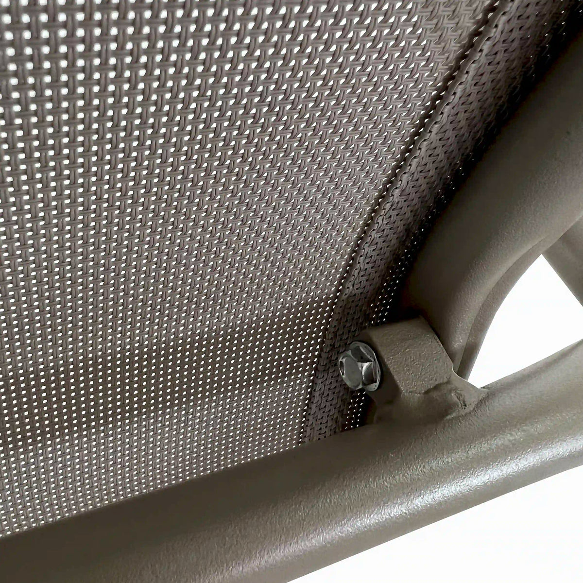 Champagne outdoor dining chair corner joint with woven mesh and metal fasteners