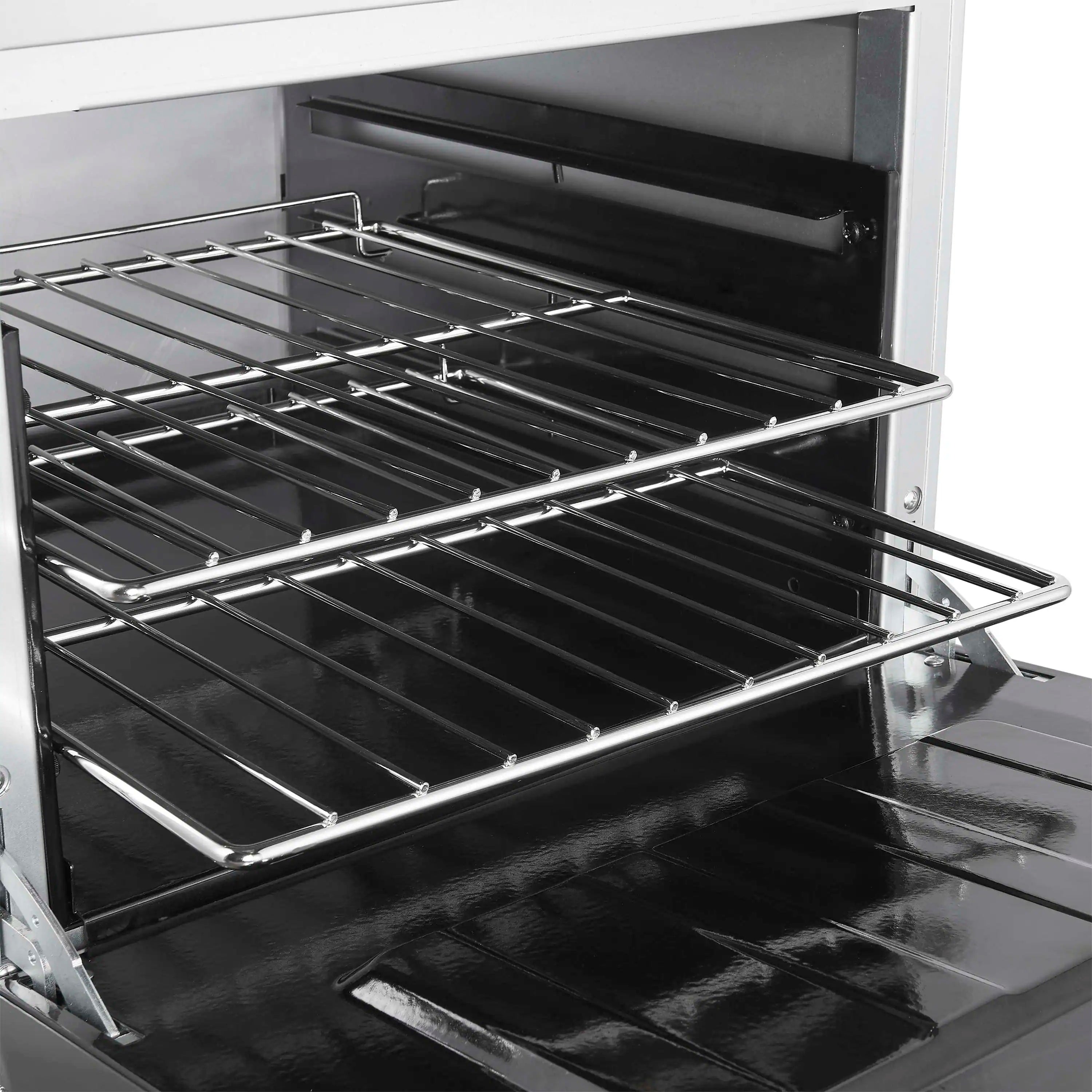Stainless oven interior with two cooking racks and black oven floor