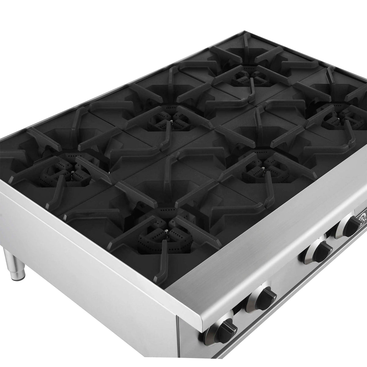 Close-up of stainless steel commercial gas hotplate black cast-iron grate grid