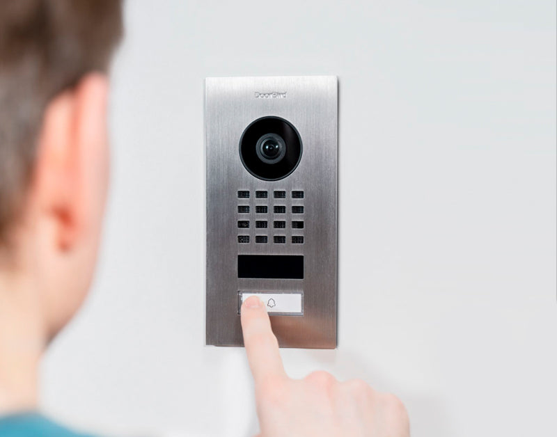 DoorBird flush-mount IP video intercom with camera lens and keypad buttons