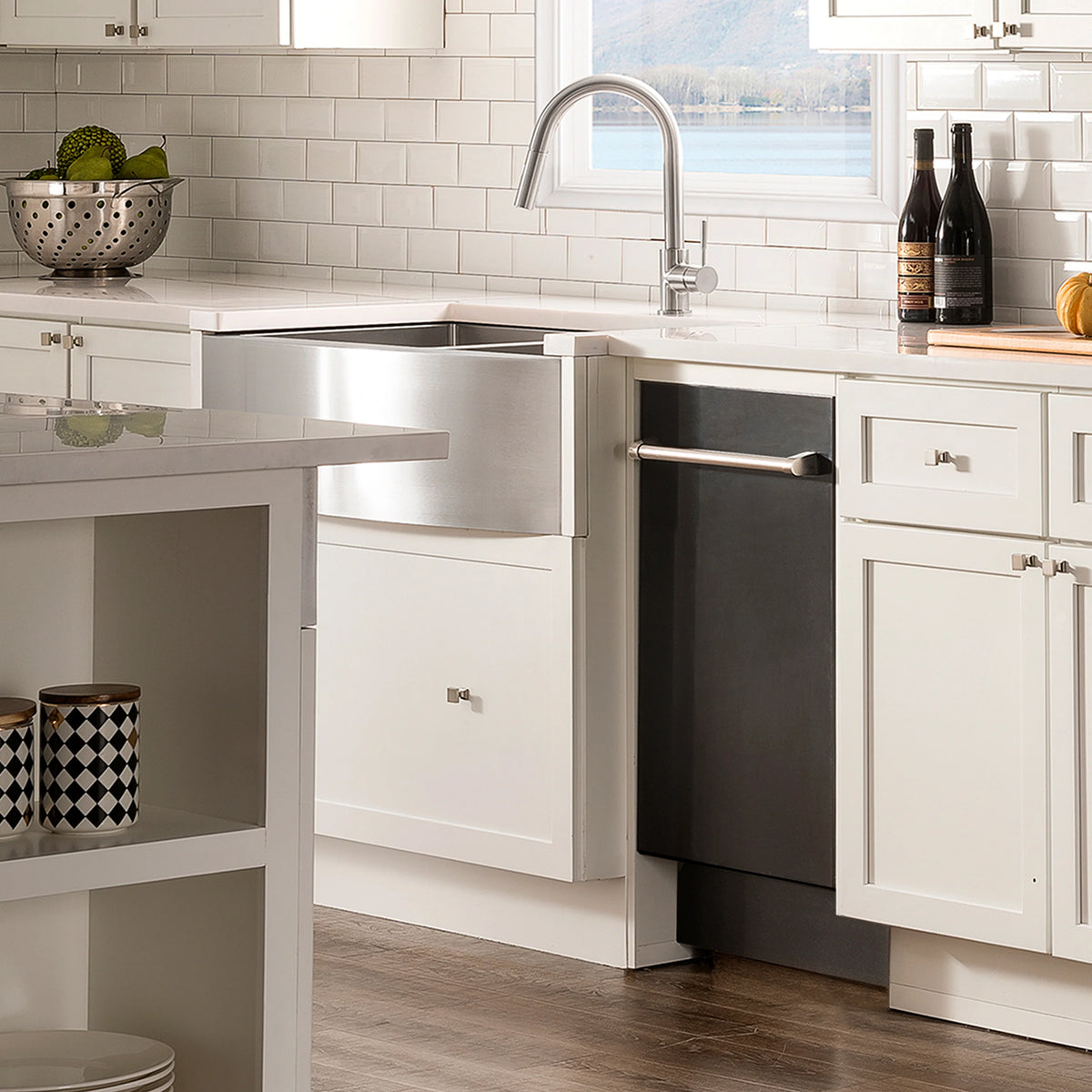 Black matte built-in dishwasher with stainless steel handle in bright kitchen