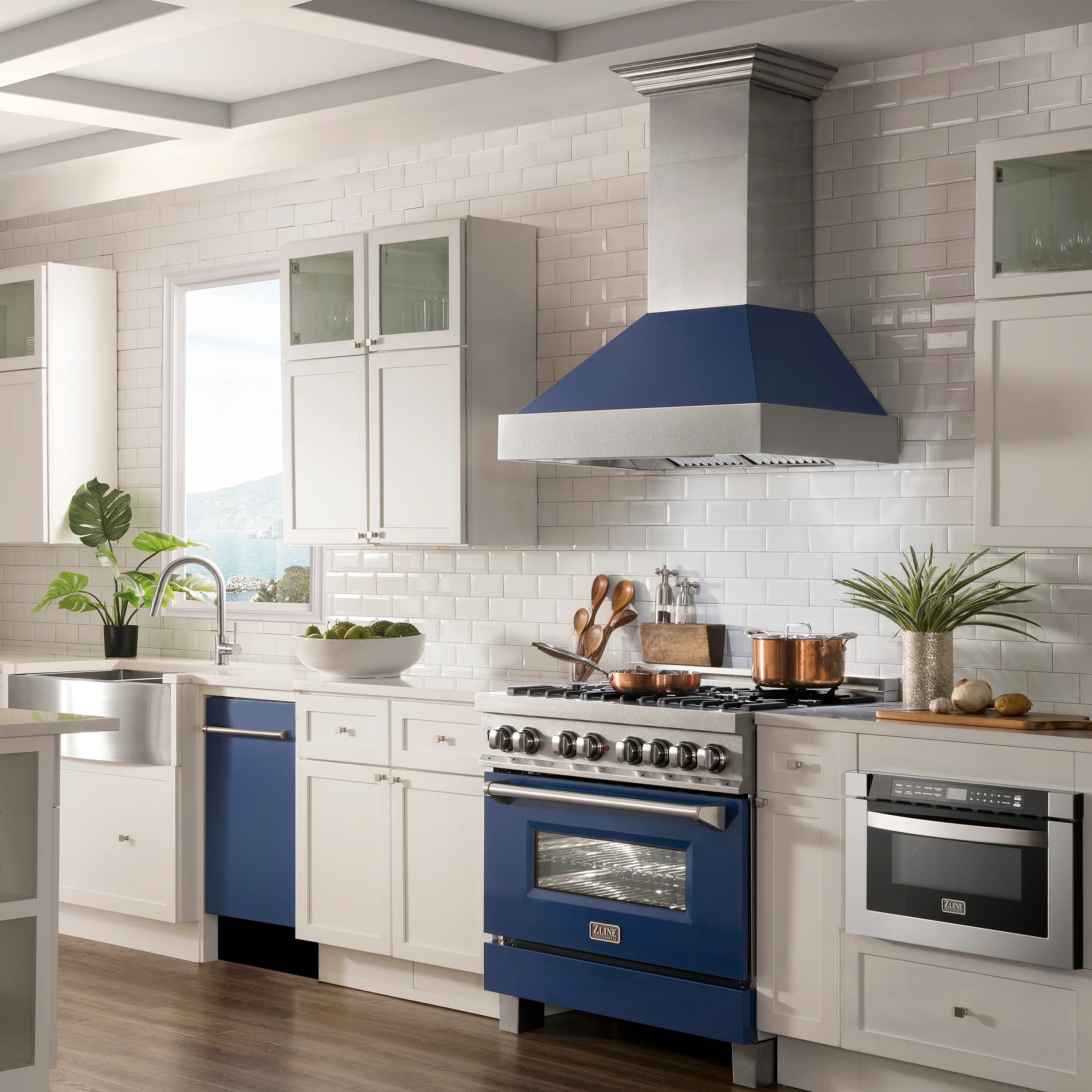 Blue matte dishwasher installed in a kitchen with surrounding cabinetry