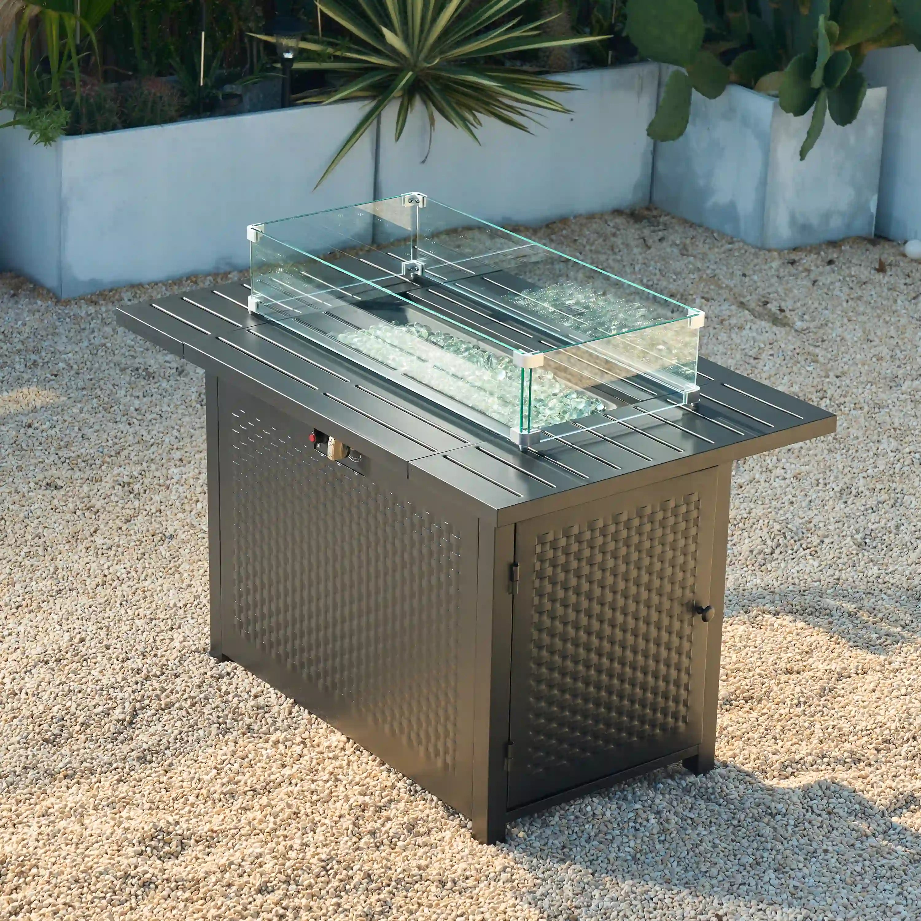 Rectangular outdoor propane gas fire pit table with clear glass lid and lava rock filler