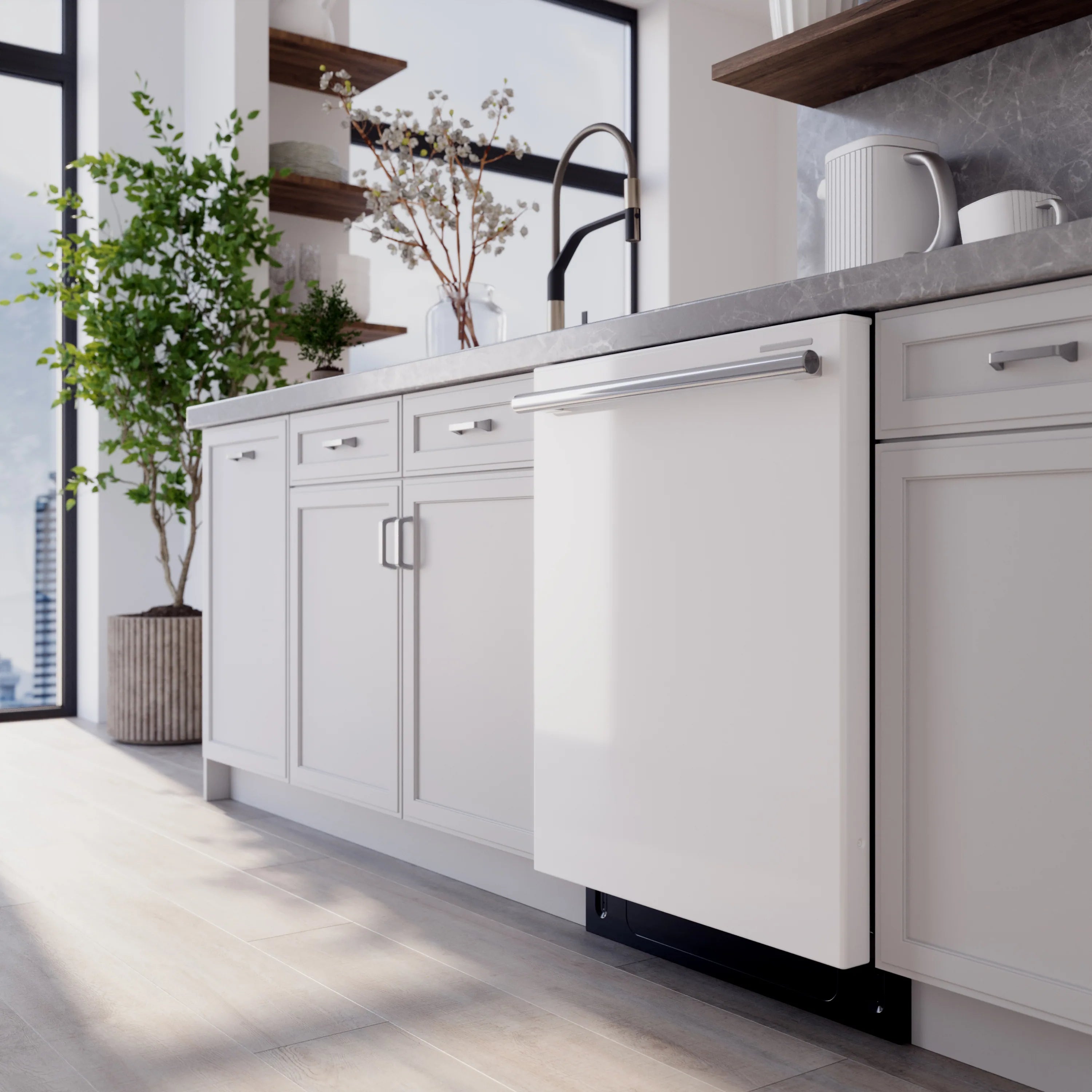 Built-in white dishwasher with stainless handle installed under a kitchen counter