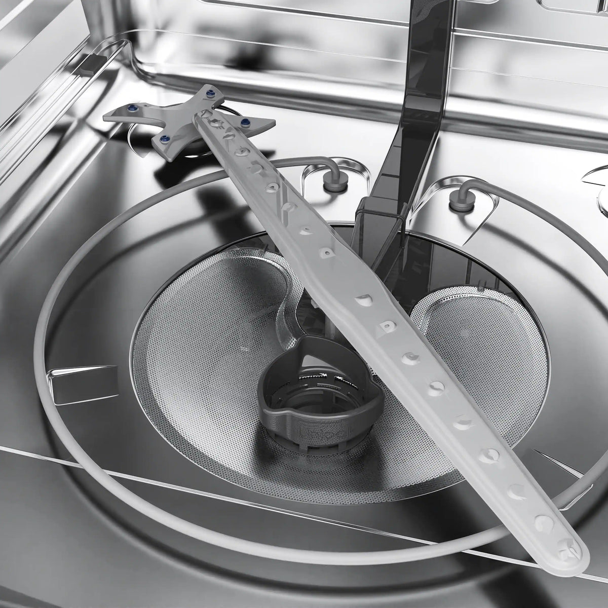 Dishwasher bottom wash area with circular filter and spray arm