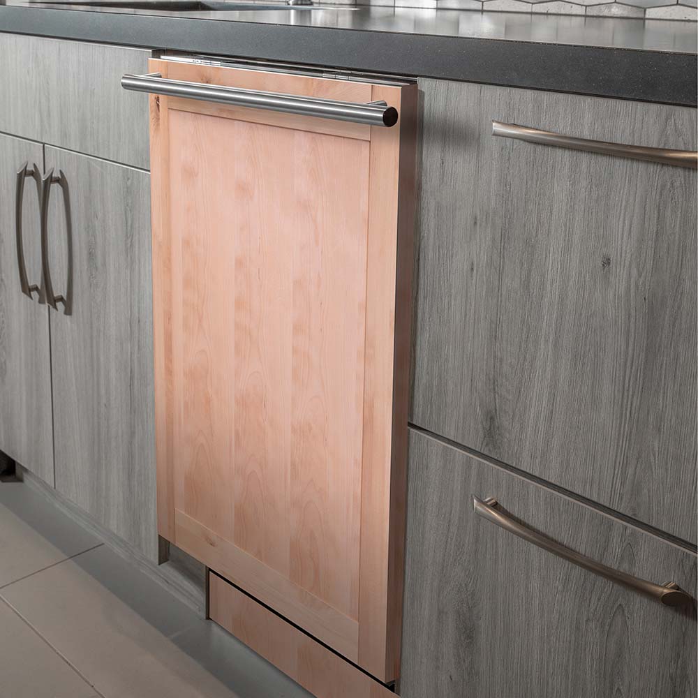 Dishwasher door with unfinished wood panel and modern stainless handle