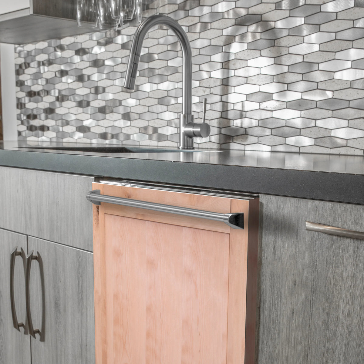 Dishwasher door panel with traditional silver bar handle and unfinished wood frame