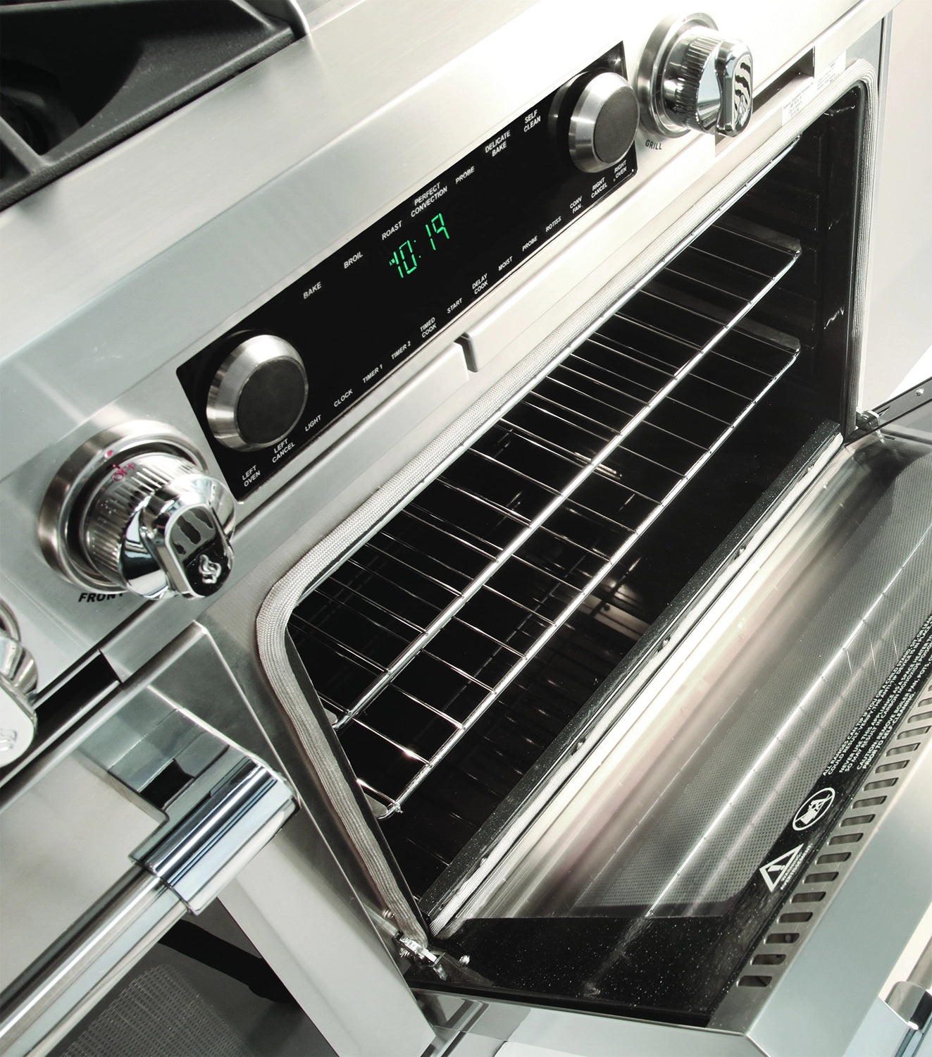 Stainless steel dual fuel range control panel with digital display and open oven