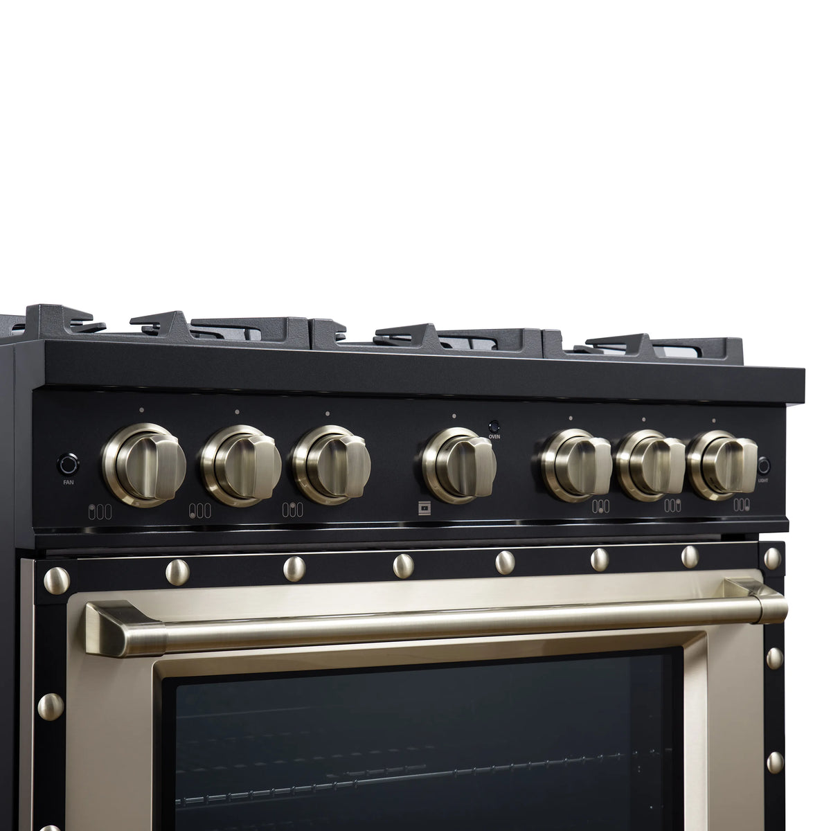 Black dual fuel range control panel with brass knobs and long oven handle