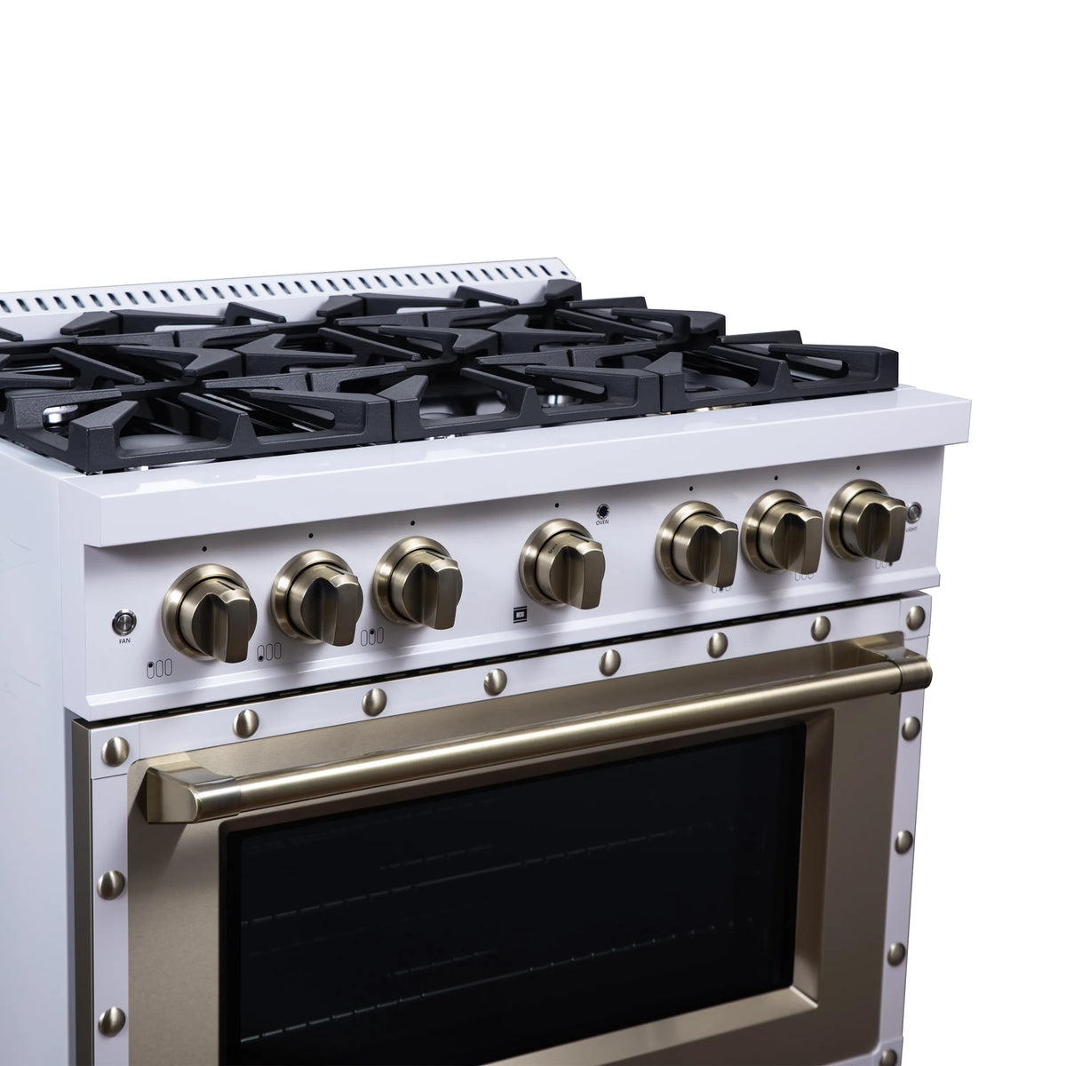White dual-fuel range cooktop with black burners and six brass control knobs