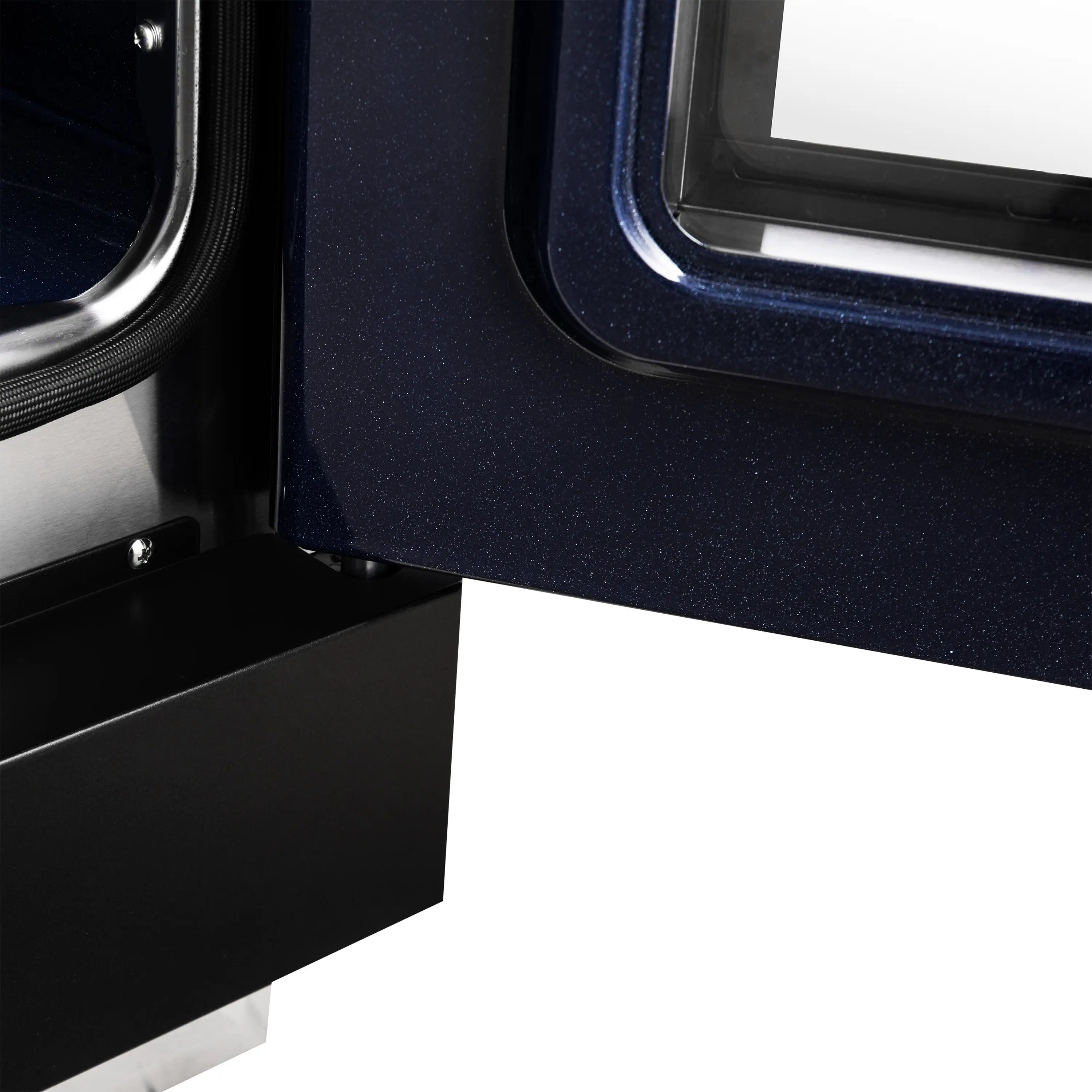 Black range side panel with large oven door frame and control area