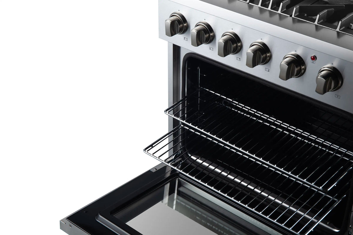 Stainless steel oven interior with wire rack and heating elements visible