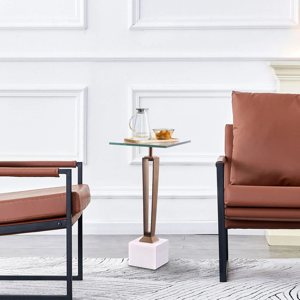 Modern martini table with green-tinted glass top and white cube base with golden frame