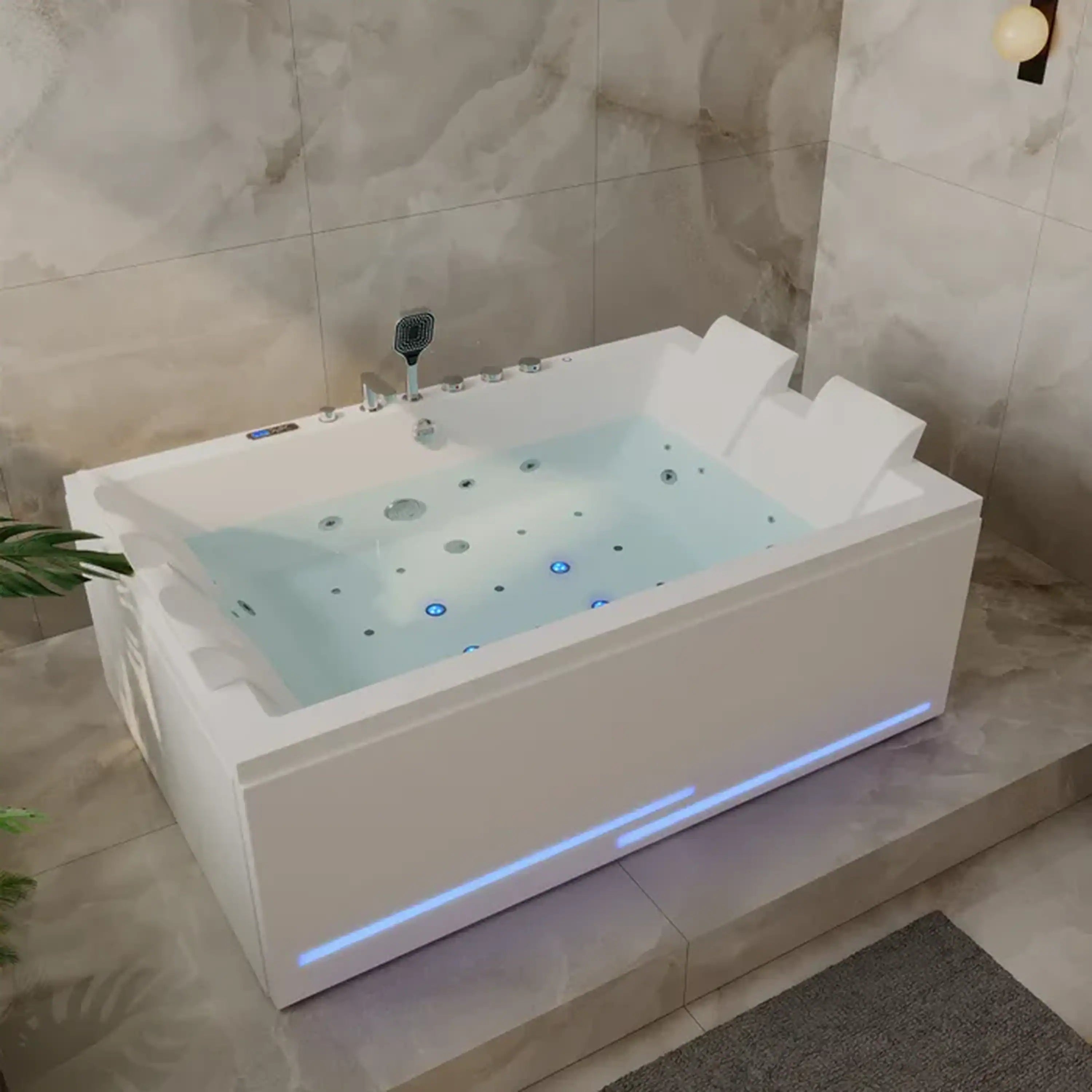 White 2-person whirlpool bathtub with blue-lit trim, jet nozzles, and faucet controls