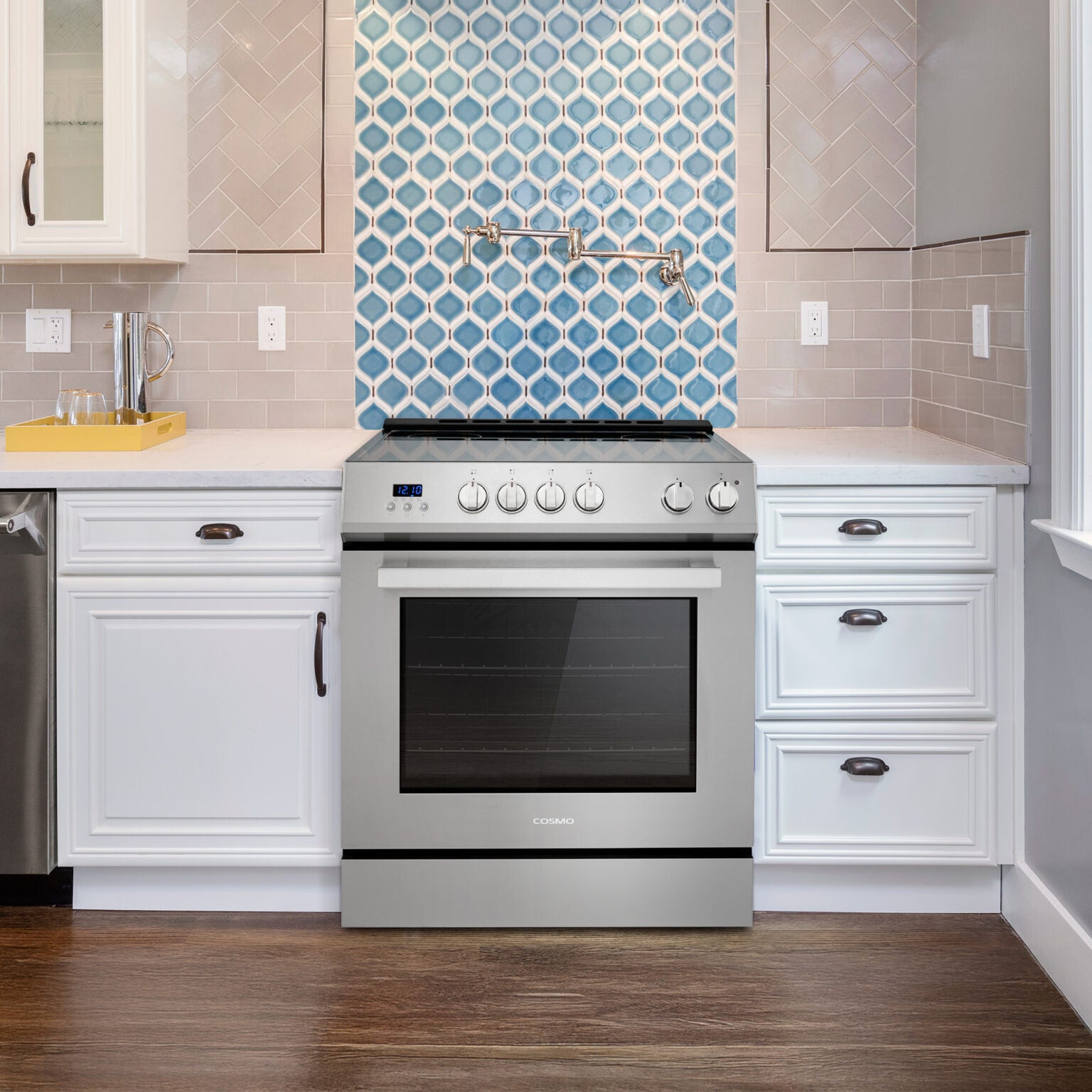 Stainless electric range with black cooktop, oven door, and control knobs in kitchen