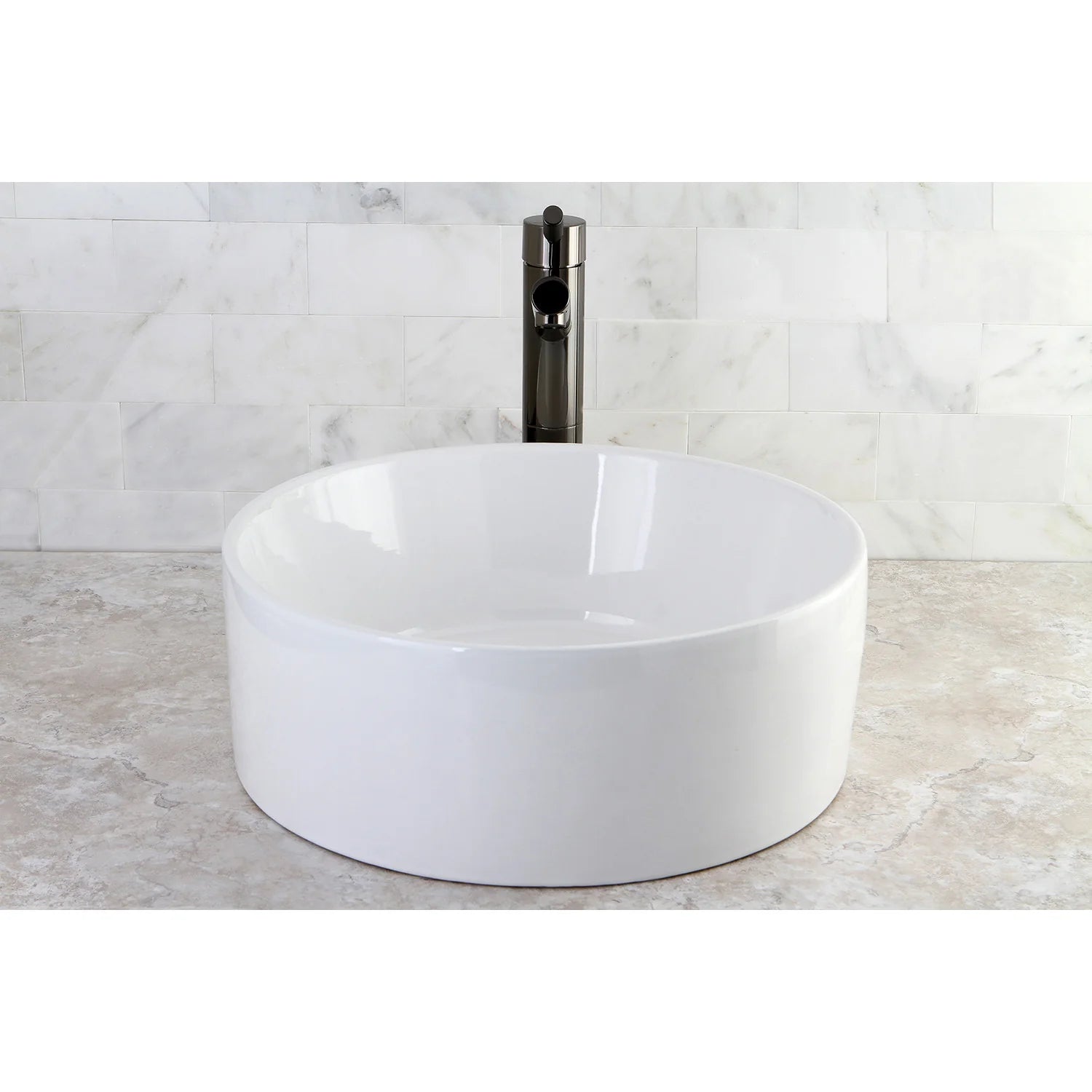 White round ceramic vessel sink with tall chrome faucet centered