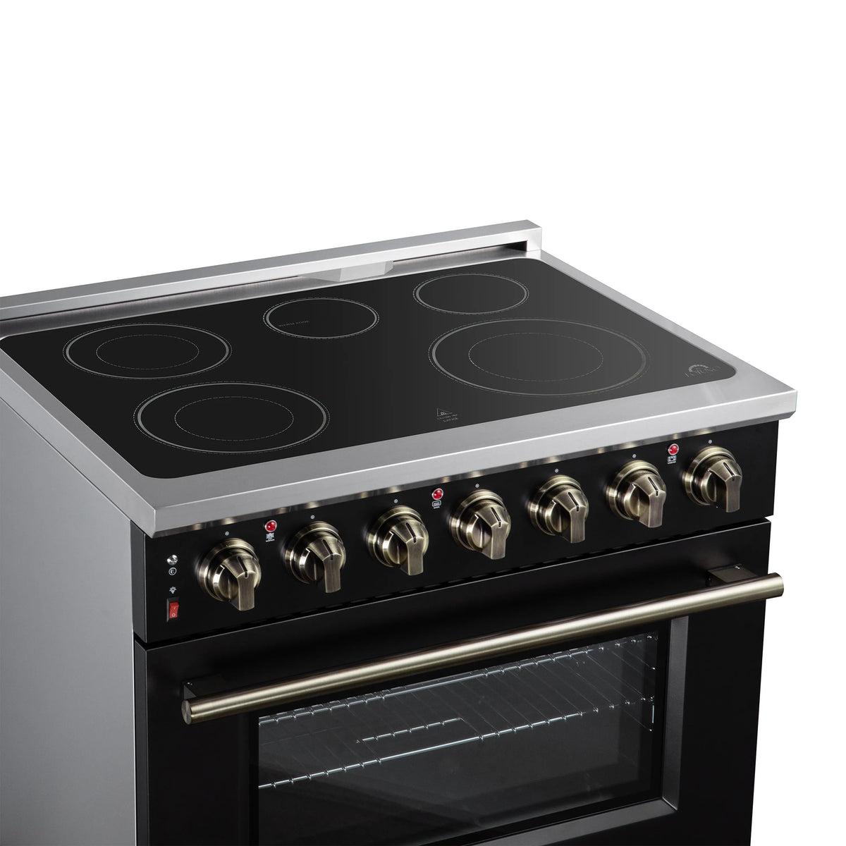 Black electric range cooktop with radiant zones, brass control knobs, and oven door