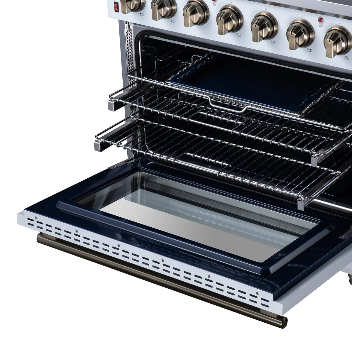 Open oven cavity with wire racks and dark baking pan, showing interior heating elements