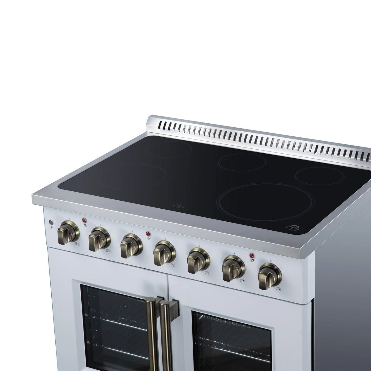 White electric range with black radiant cooktop, brass knobs, and dual glass oven doors