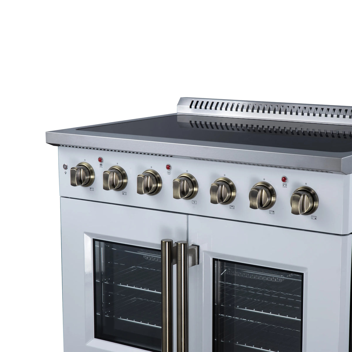 White electric range top controls with brass-finish knobs and two glass oven doors