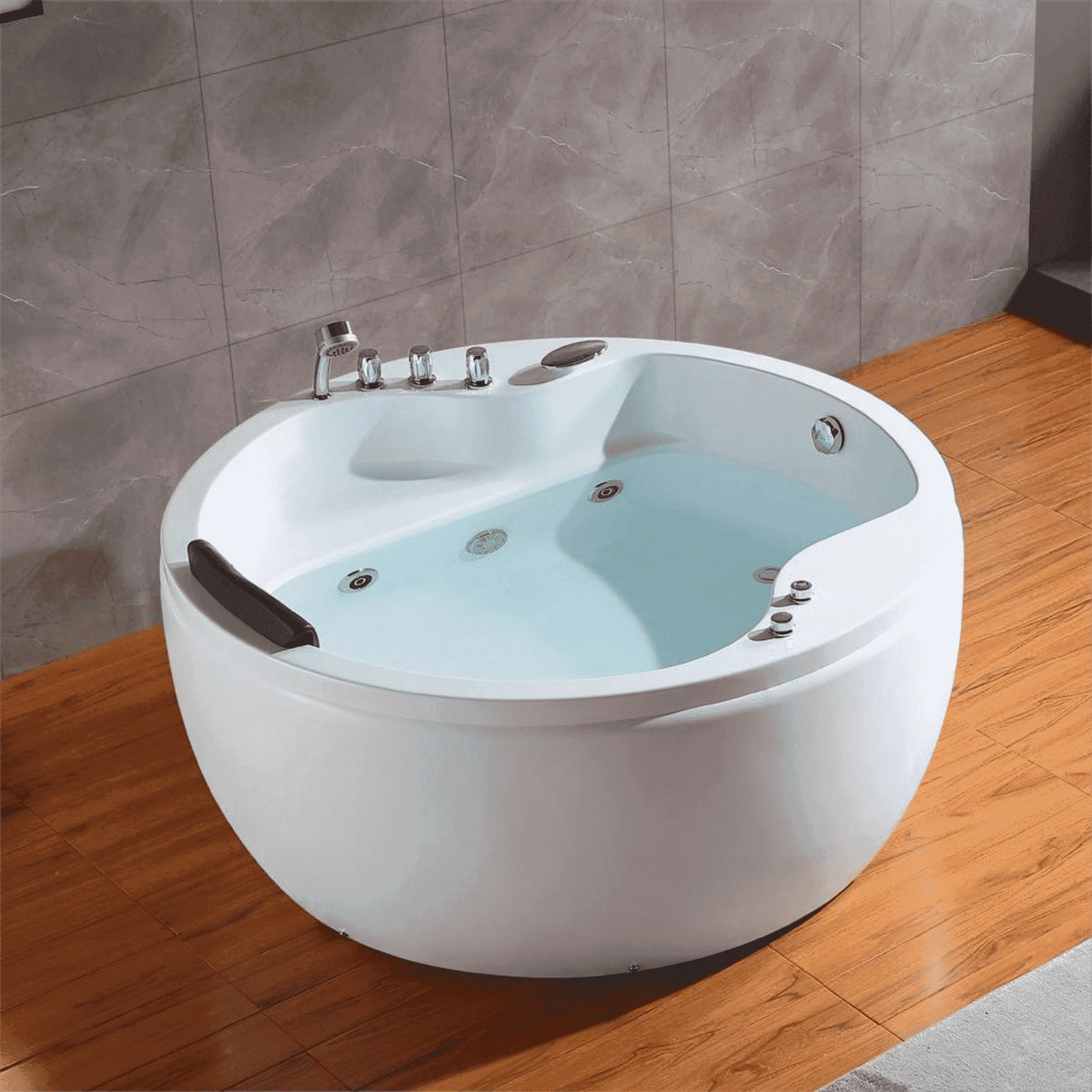 White round whirlpool bathtub with chrome jets and control panel on the rim