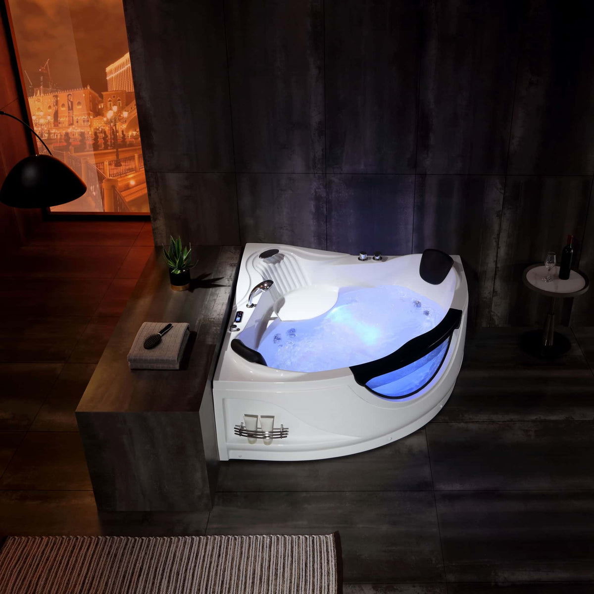 White corner whirlpool bathtub with blue LED light ring and black armrest panels